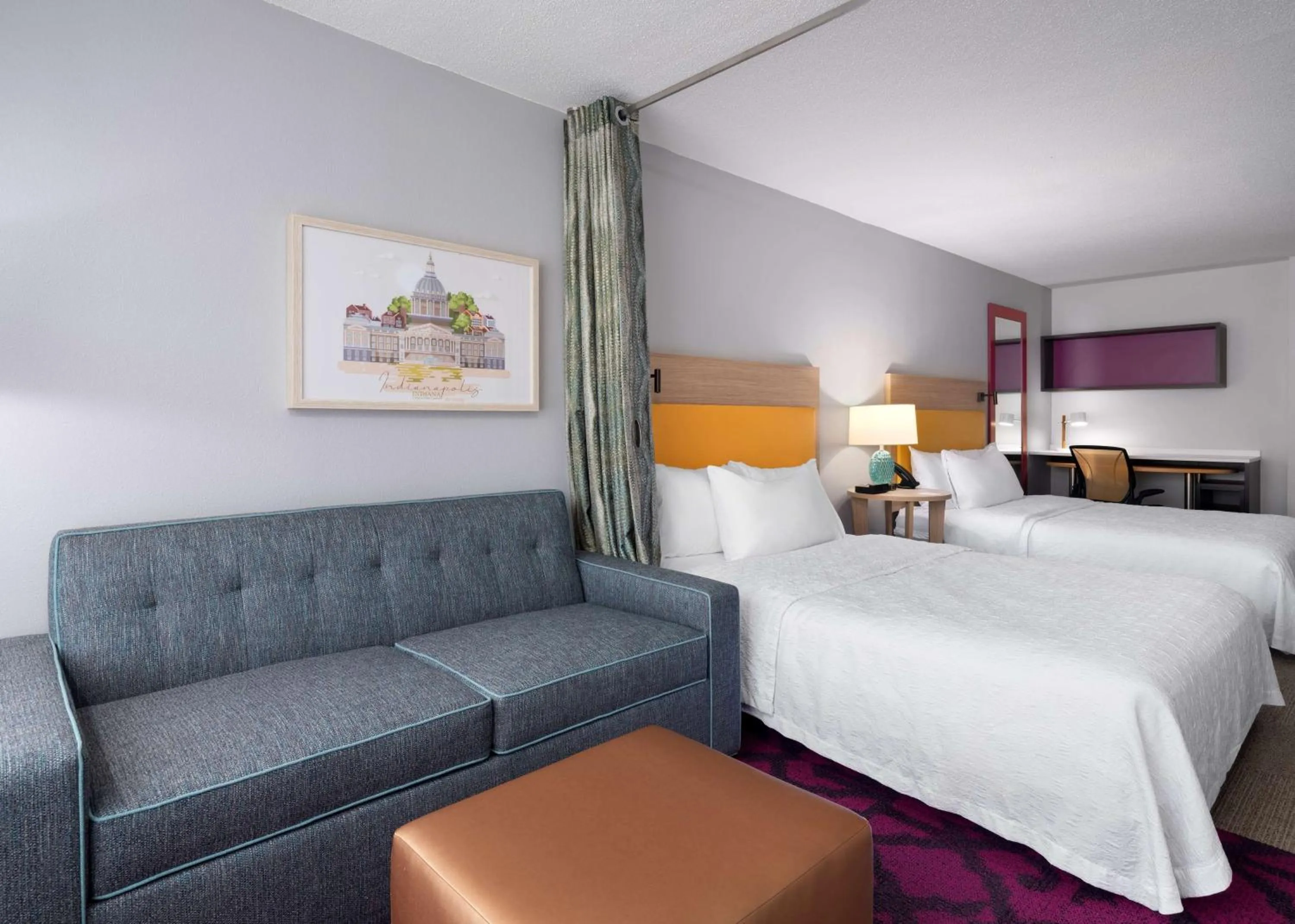 Living room, Bed in Home2 Suites by Hilton Indianapolis - Keystone Crossing