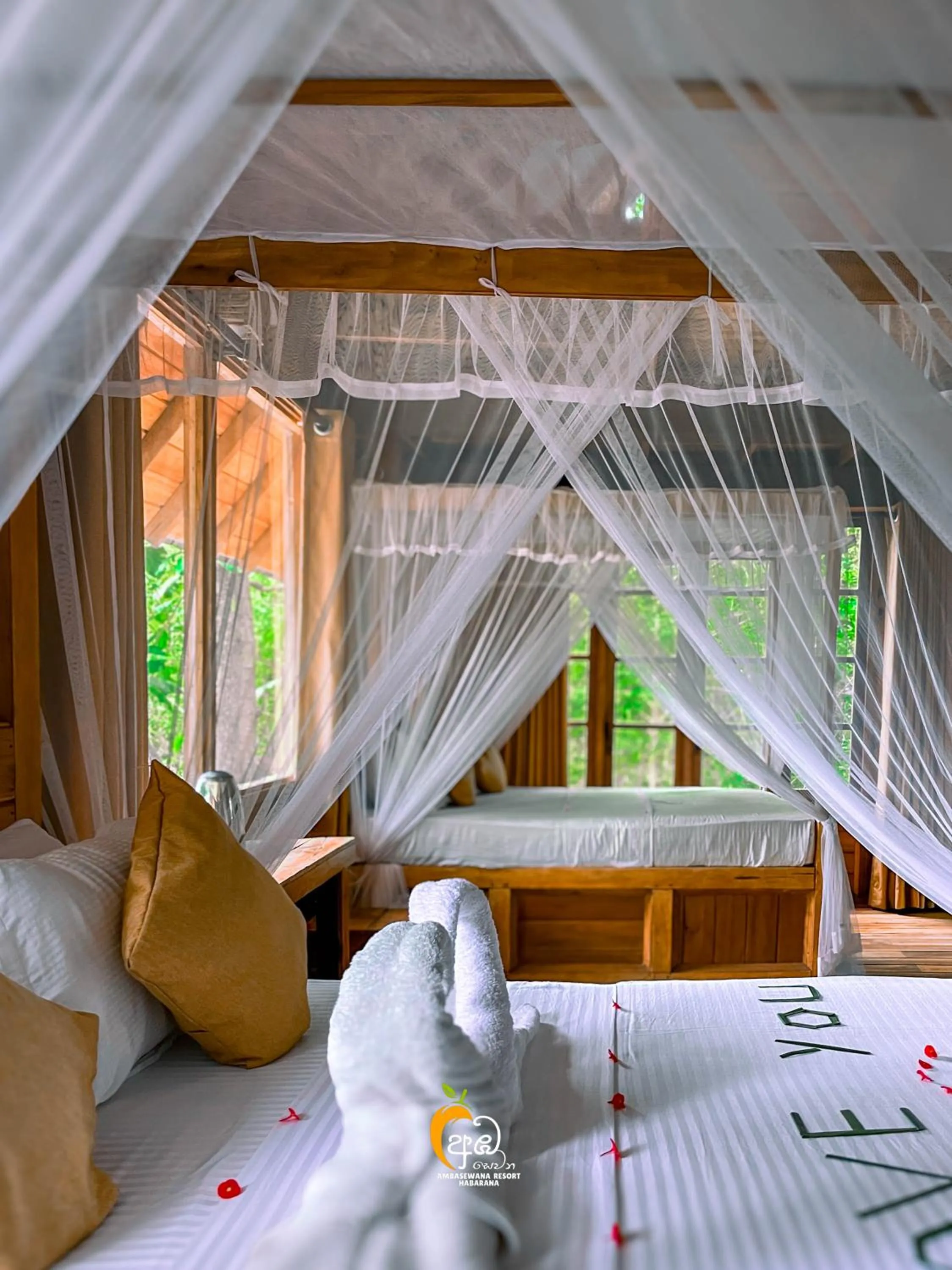 Bed in Habarana Tree House Ambasewana Resort
