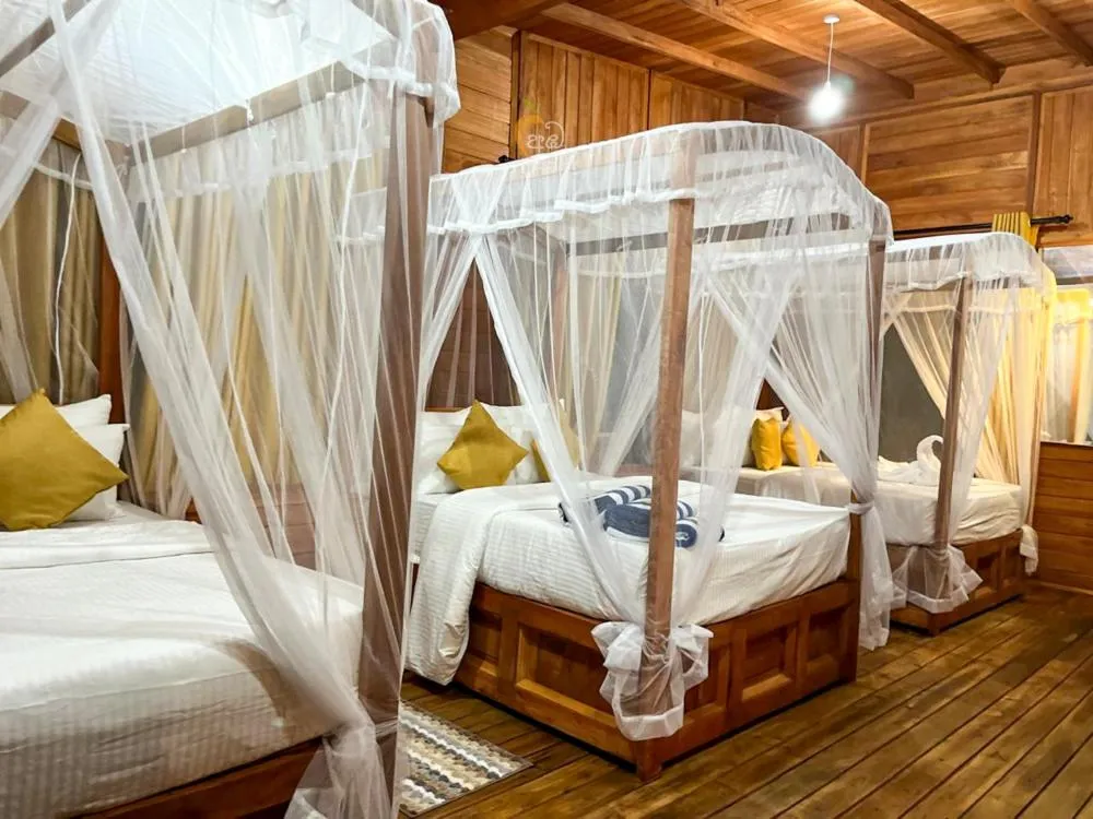 Bed in Habarana Tree House Ambasewana Resort