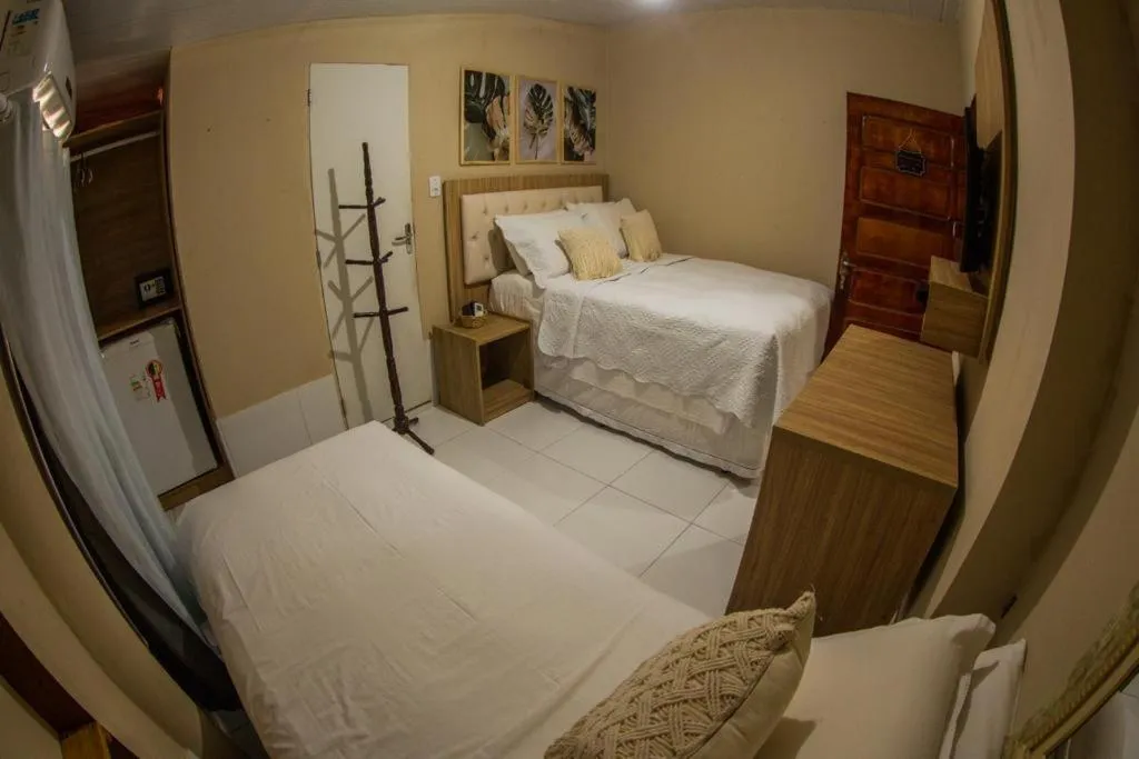 Bed in Pousada da Leide