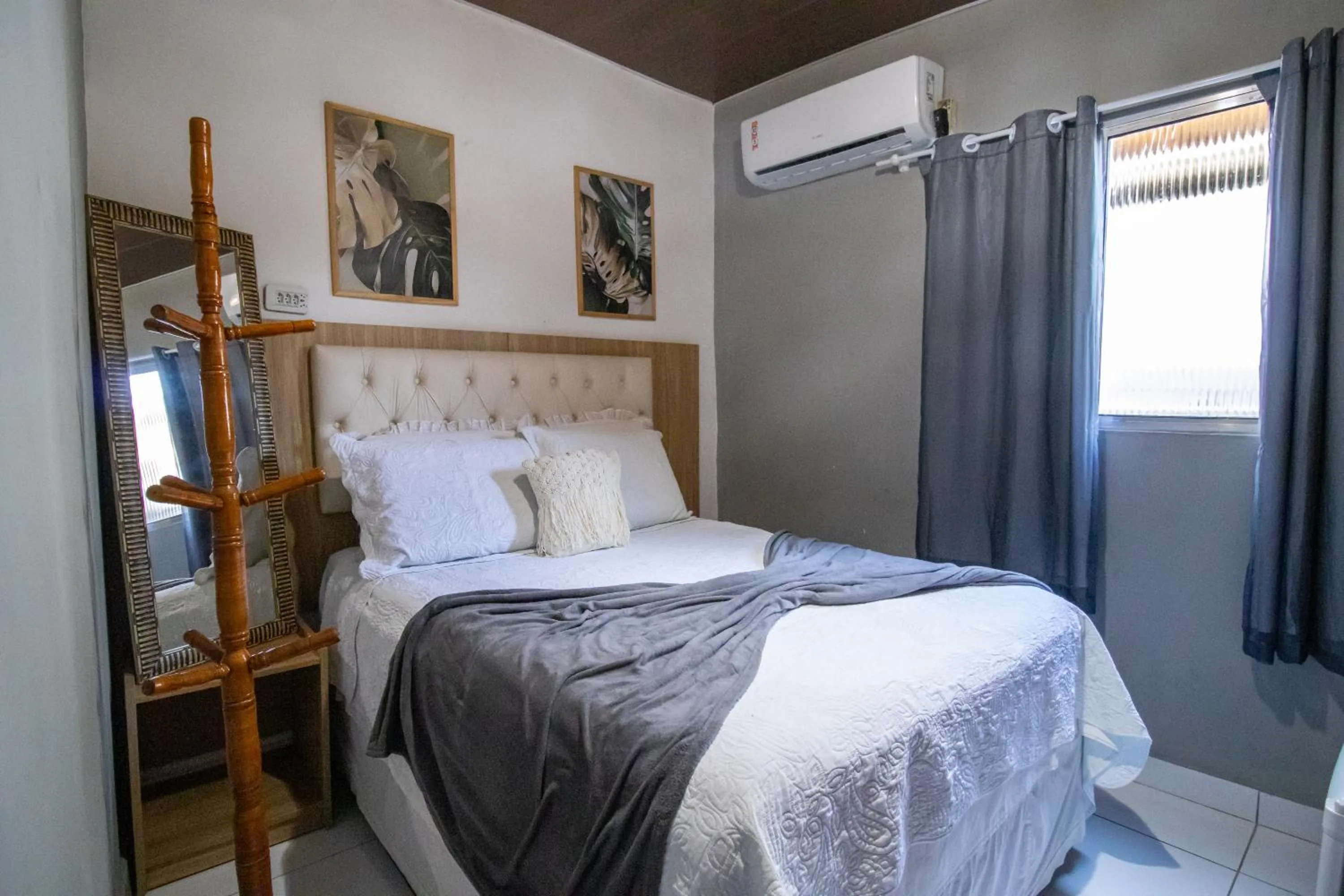 Bed in Pousada da Leide