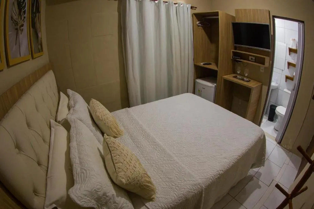 Bed in Pousada da Leide