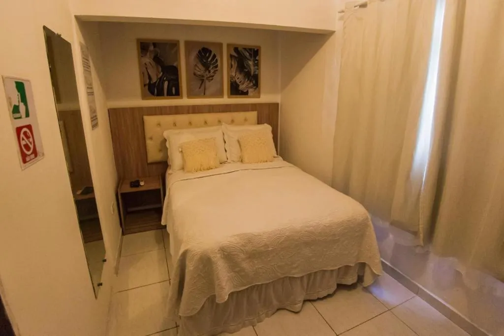 Bed in Pousada da Leide