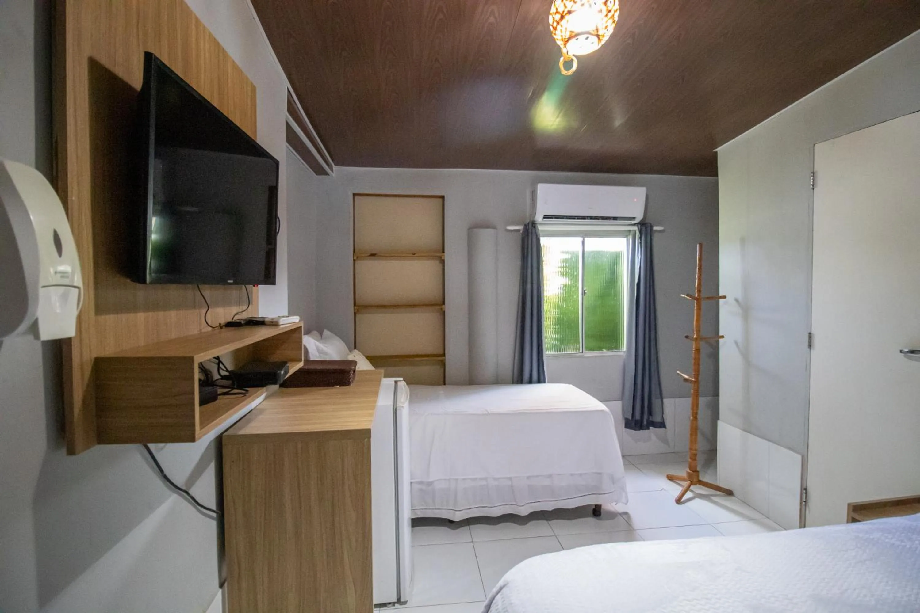 Bed in Pousada da Leide