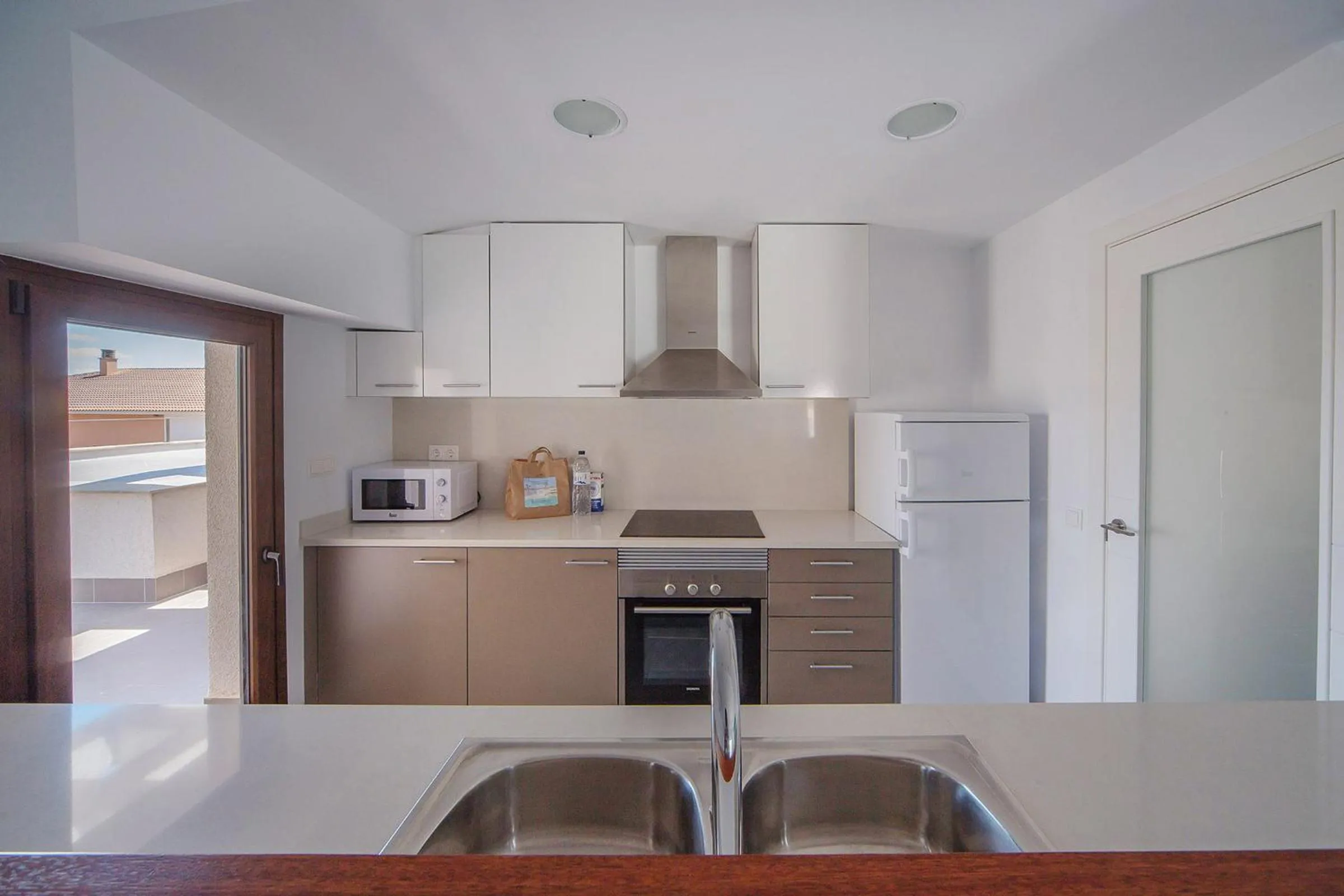 Kitchen or kitchenette in Aparthotel Caprice Skyline