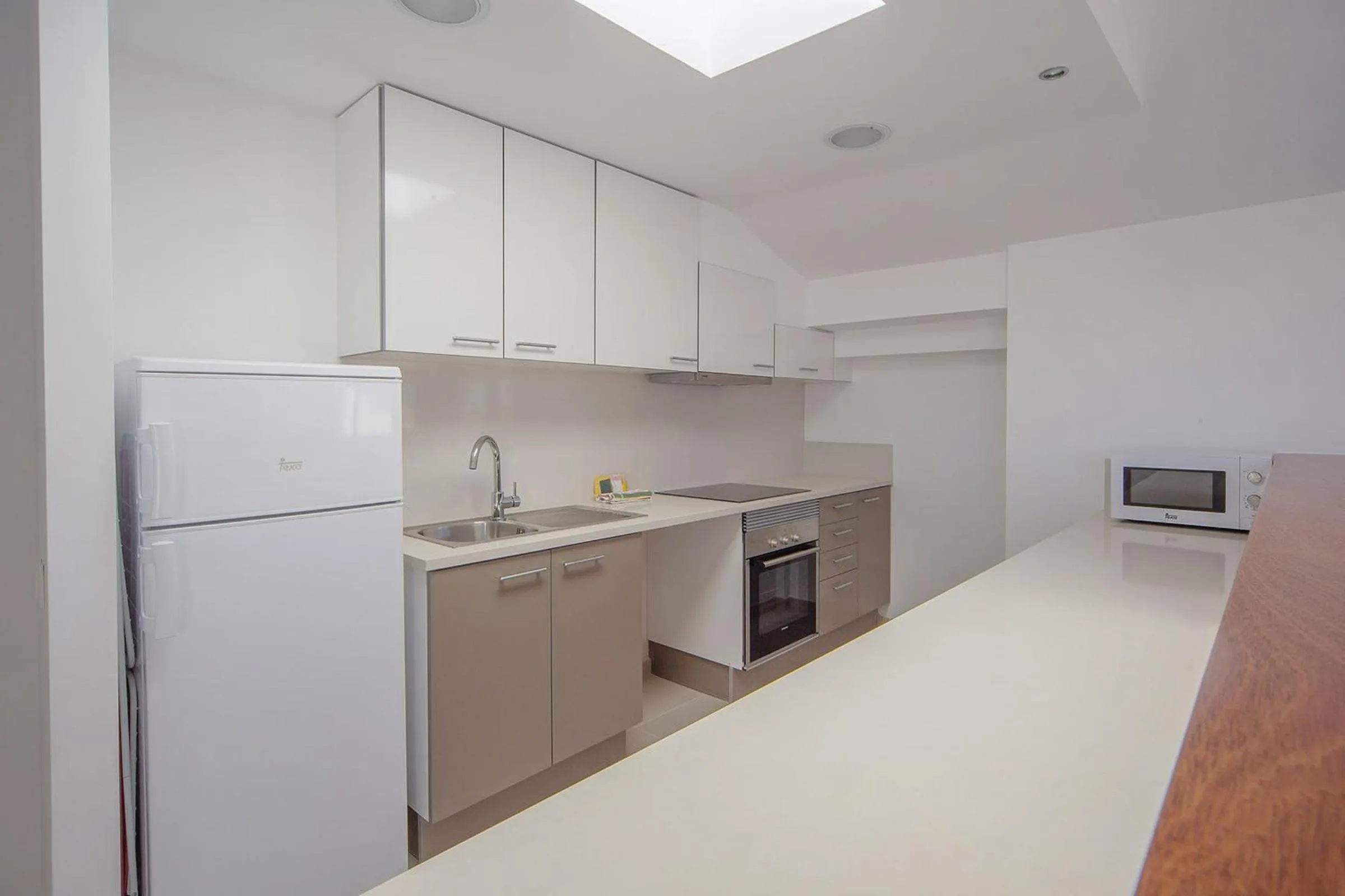 Kitchen or kitchenette in Aparthotel Caprice Skyline