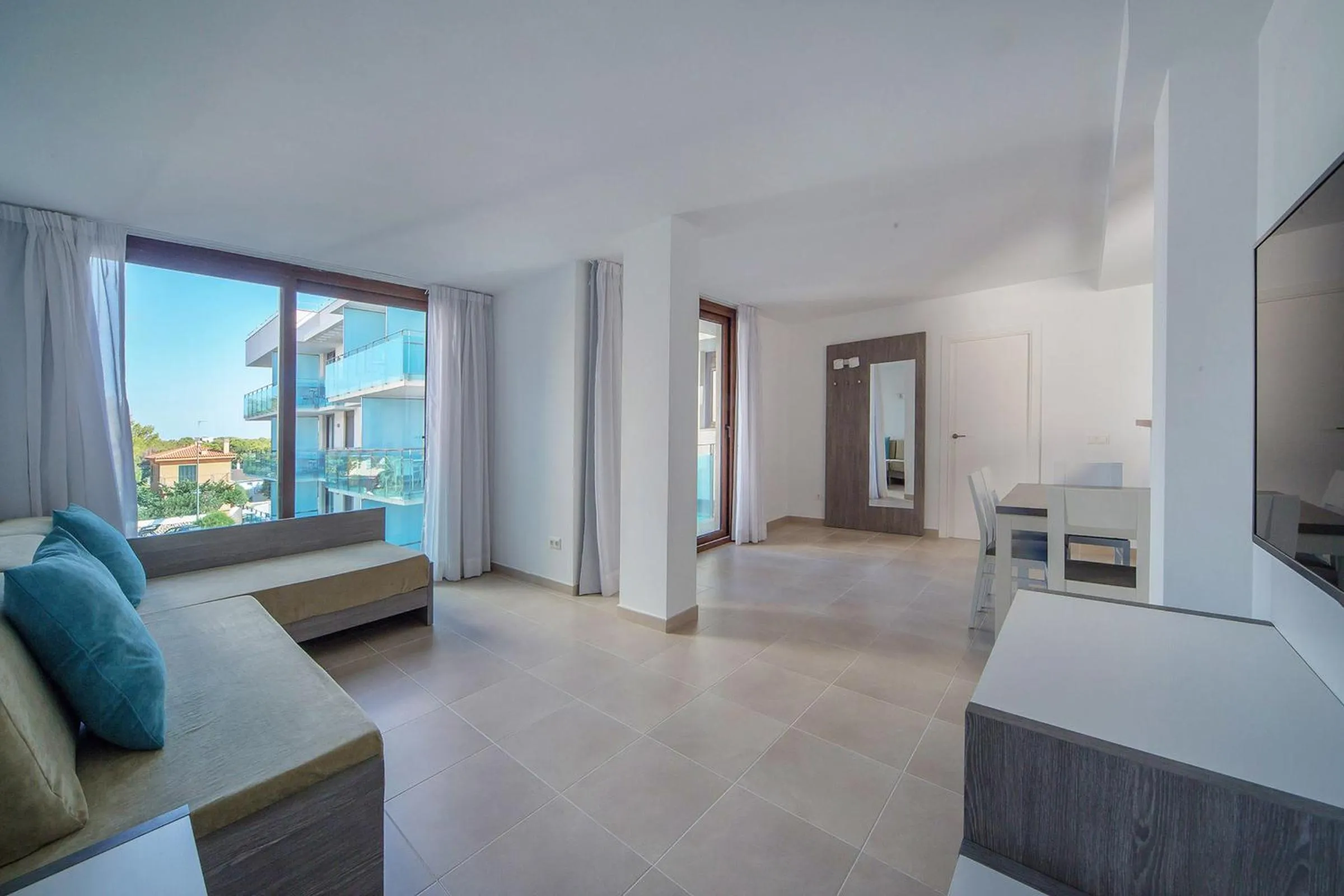 Living room in Aparthotel Caprice Skyline