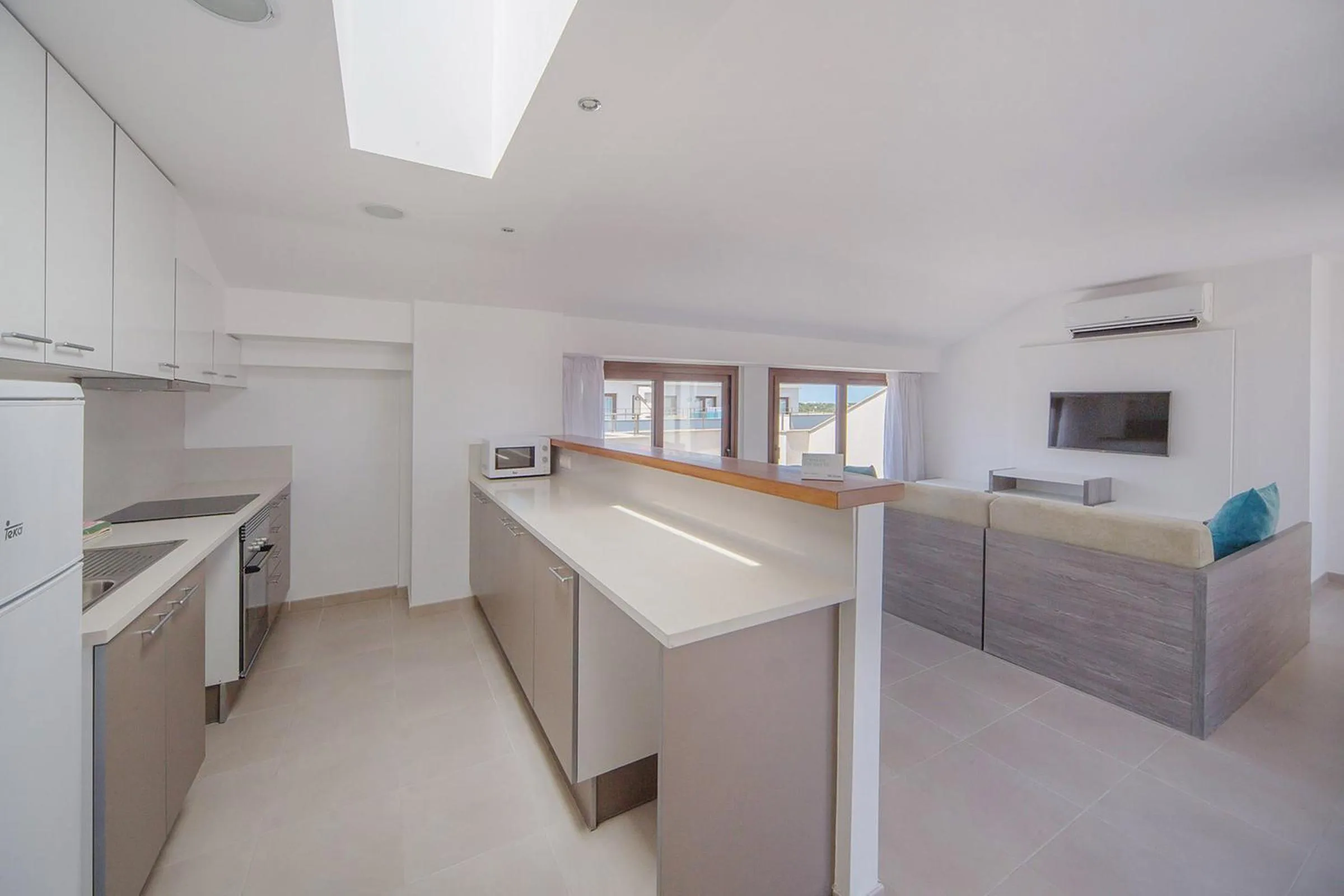 Kitchen or kitchenette in Aparthotel Caprice Skyline