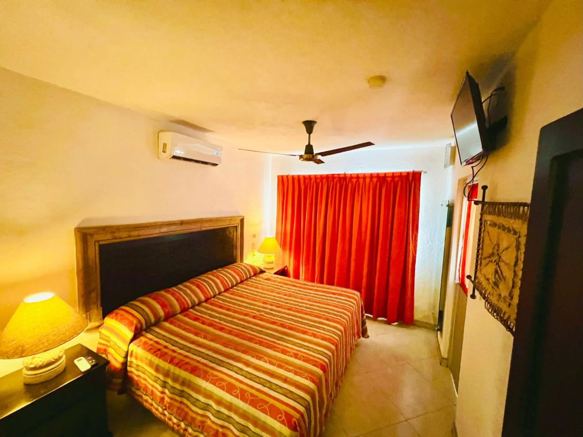 Bed in Los Picos Hotel & Suites Bucerias