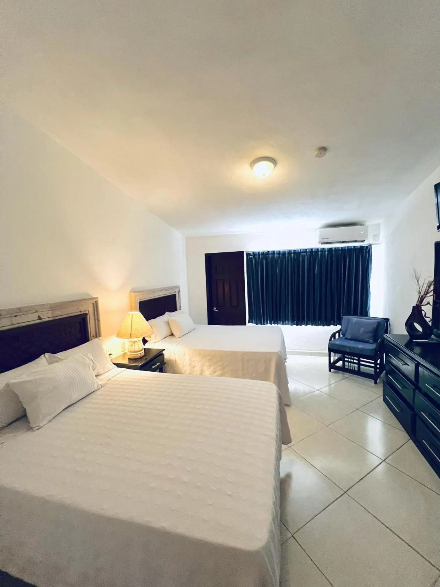 Bed in Los Picos Hotel & Suites Bucerias