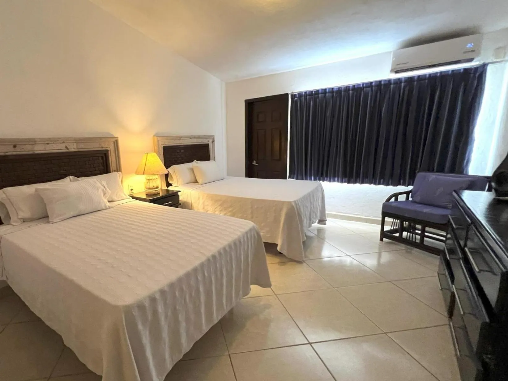 Bed in Los Picos Hotel & Suites Bucerias