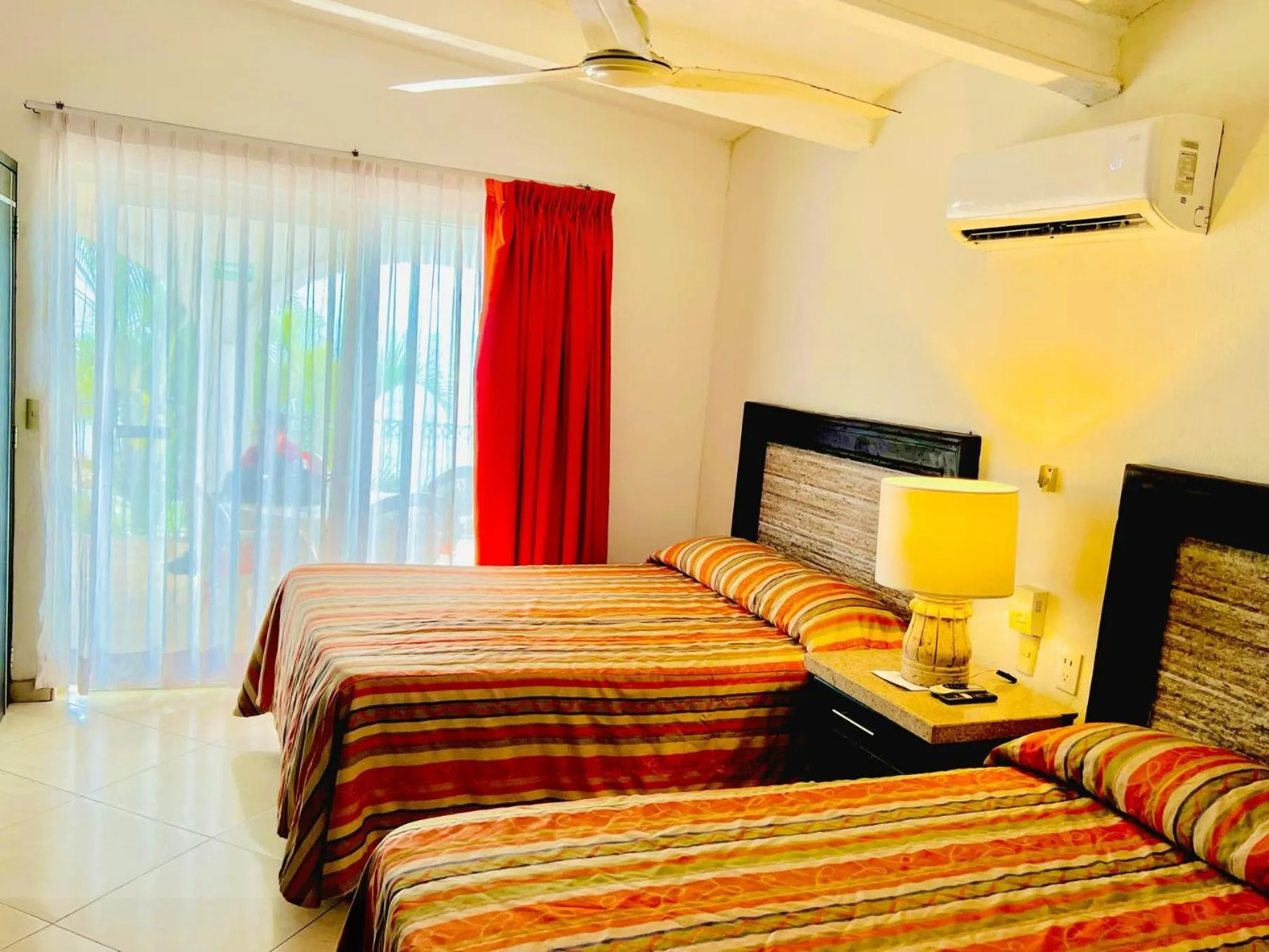 Photo of the whole room, Bed in Los Picos Hotel & Suites Bucerias