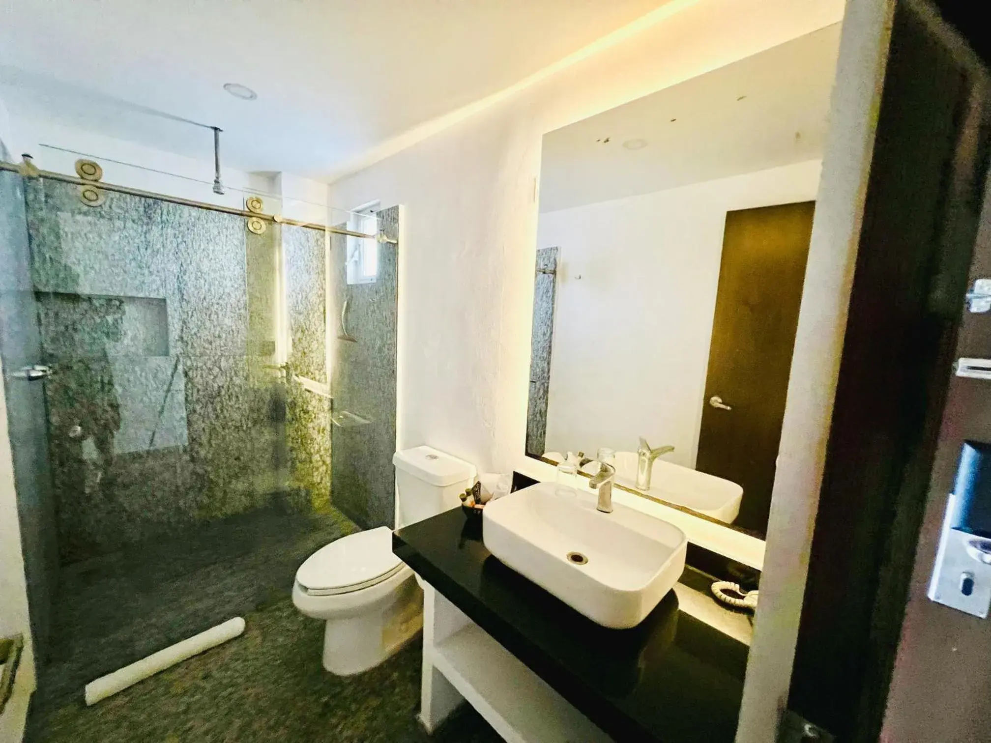 Bathroom in Los Picos Hotel & Suites Bucerias Bathroom in Los Picos Hotel & Suites Bucerias