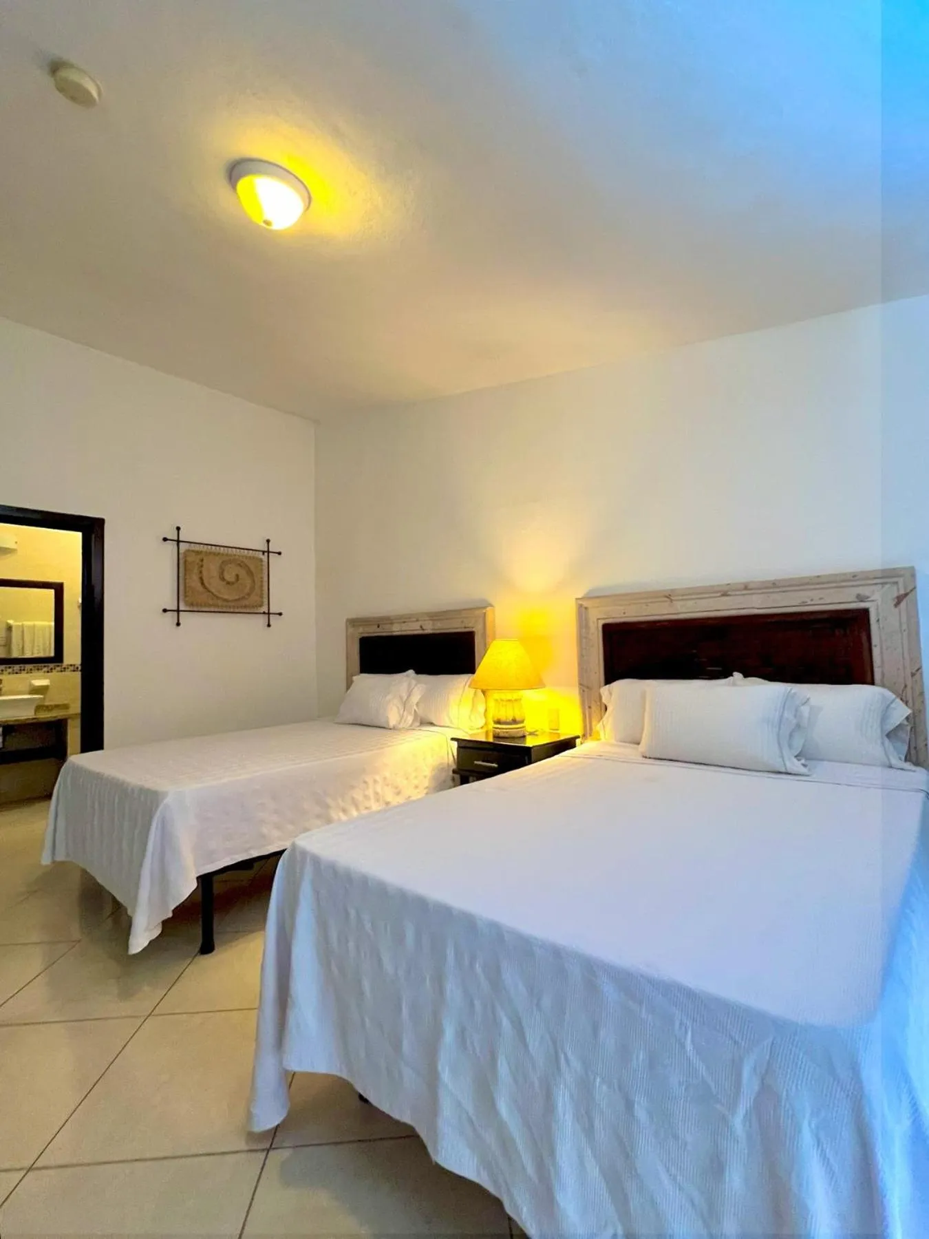 Bed in Los Picos Hotel & Suites Bucerias