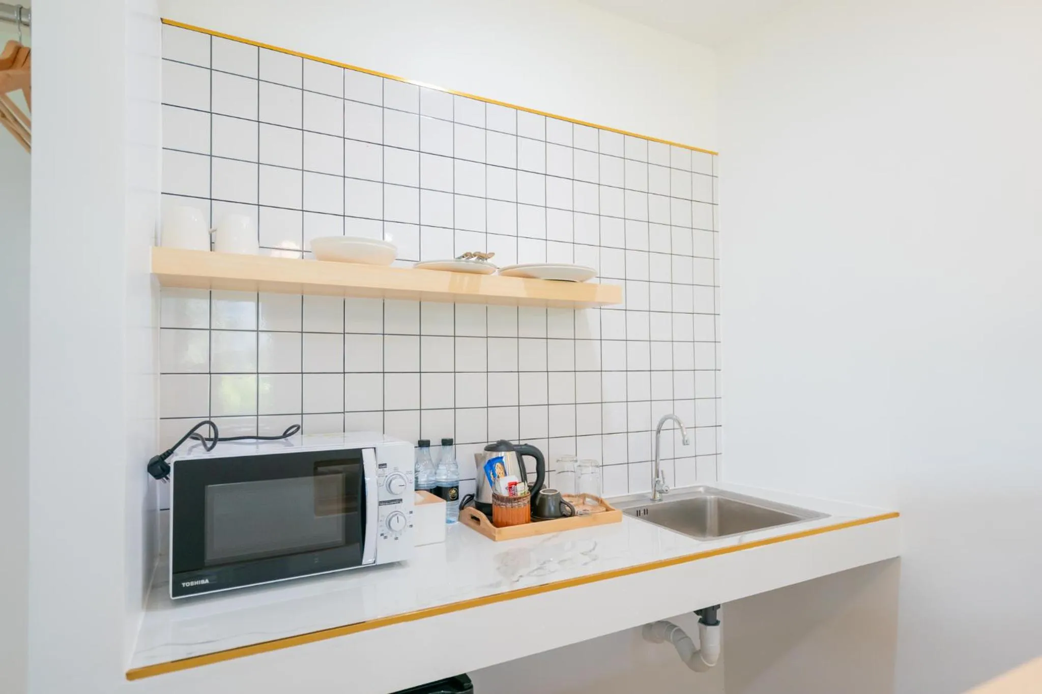 Kitchen or kitchenette in Phunaya Phuket Oldtown Hotel
