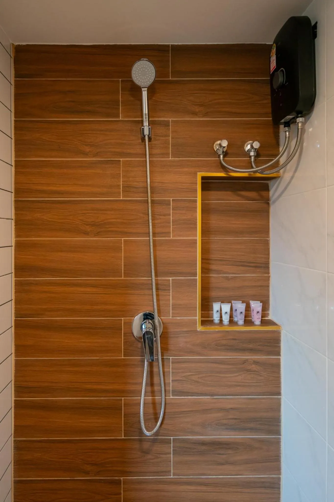 Shower in Phunaya Phuket Oldtown Hotel
