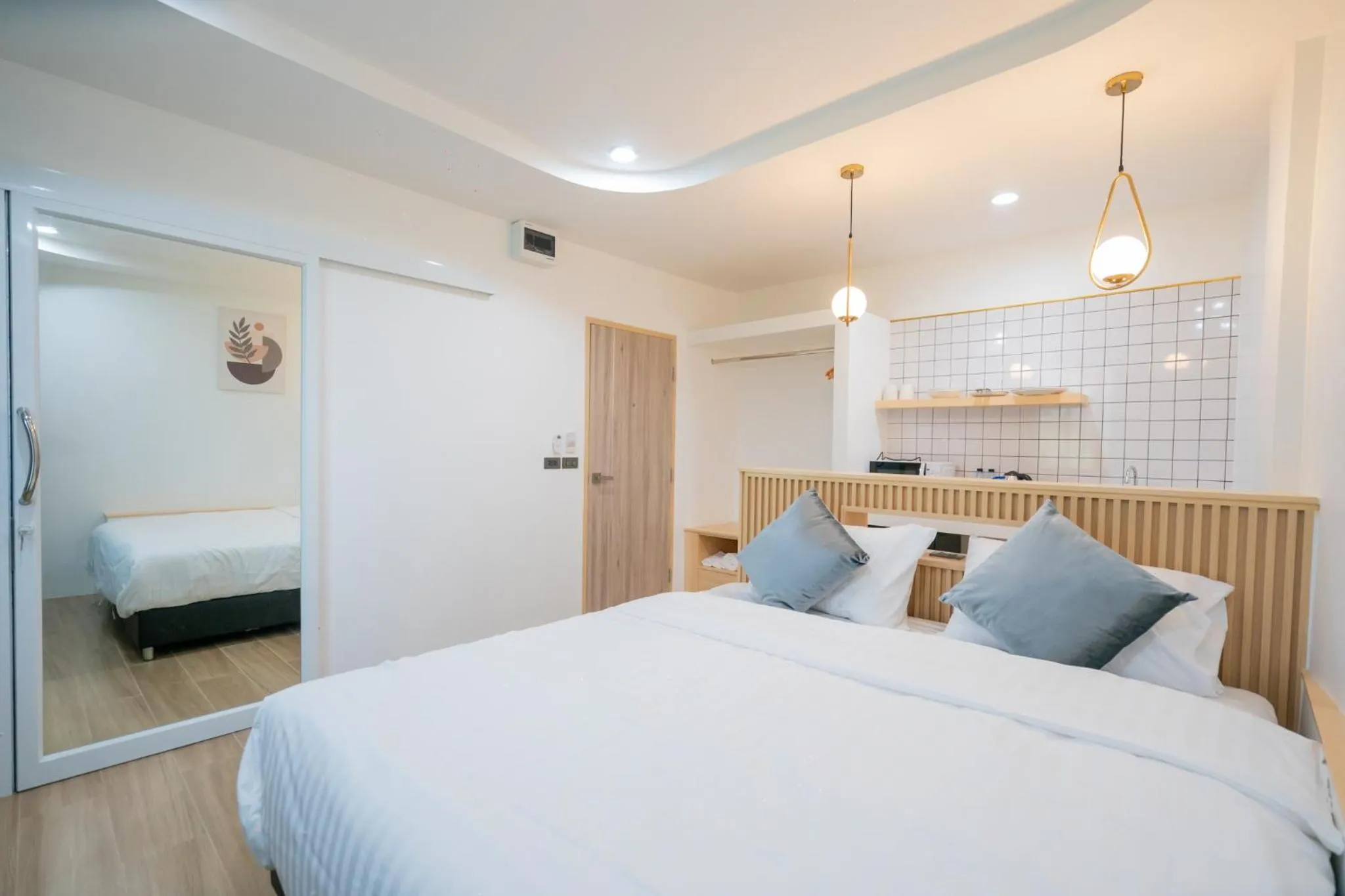 Bed in Phunaya Phuket Oldtown Hotel