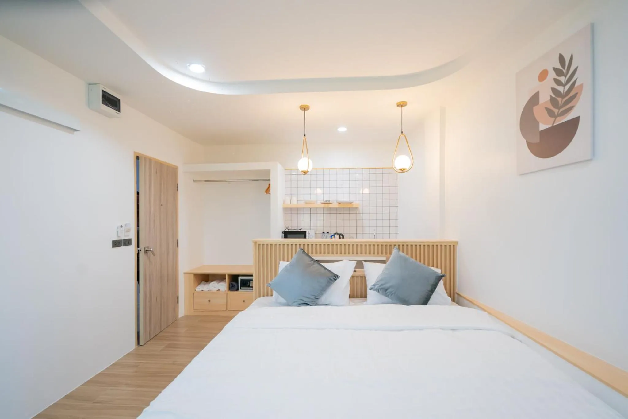 Bed in Phunaya Phuket Oldtown Hotel