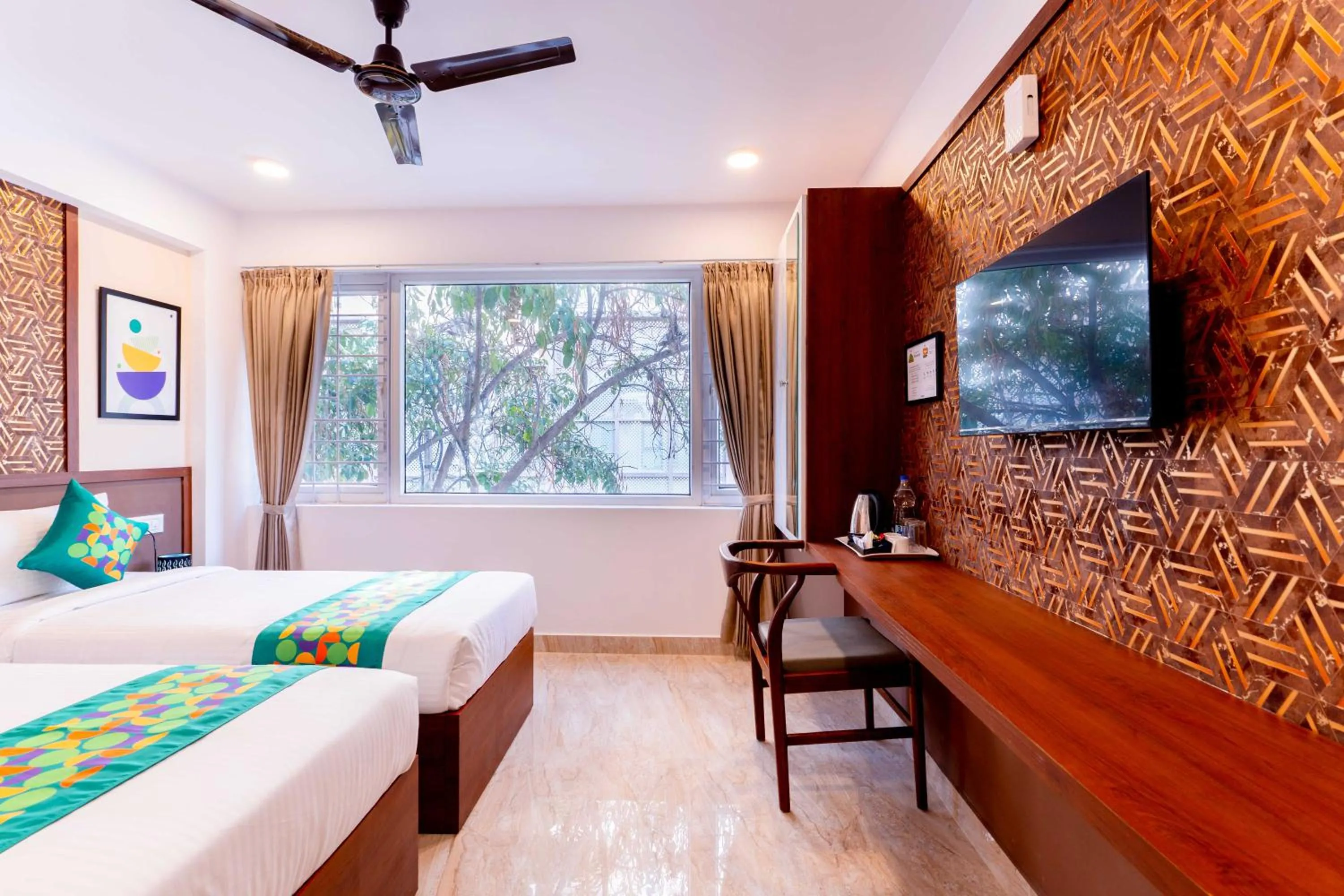Bedroom, Bed in Treebo Emirates Suites Indiranagar