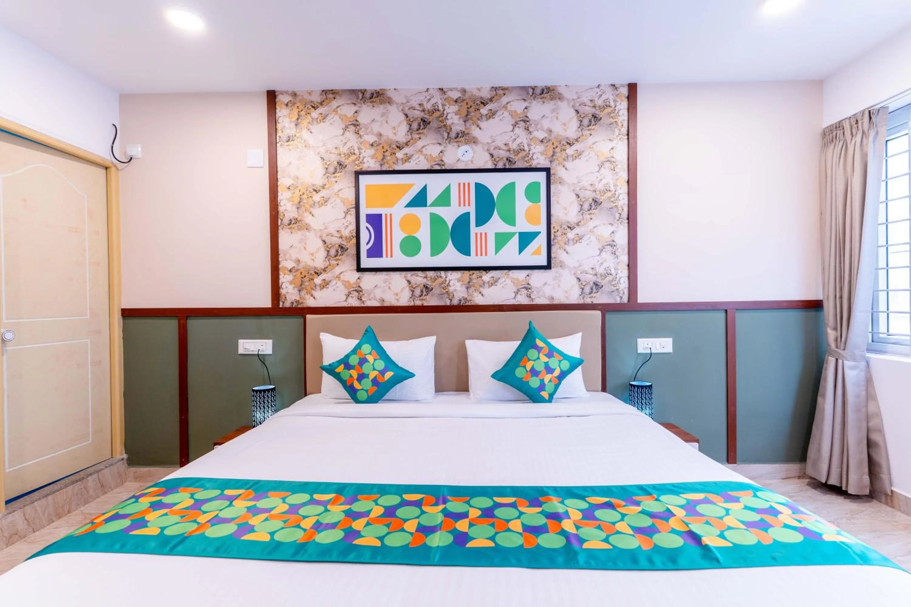 Bedroom, Bed in Treebo Emirates Suites Indiranagar