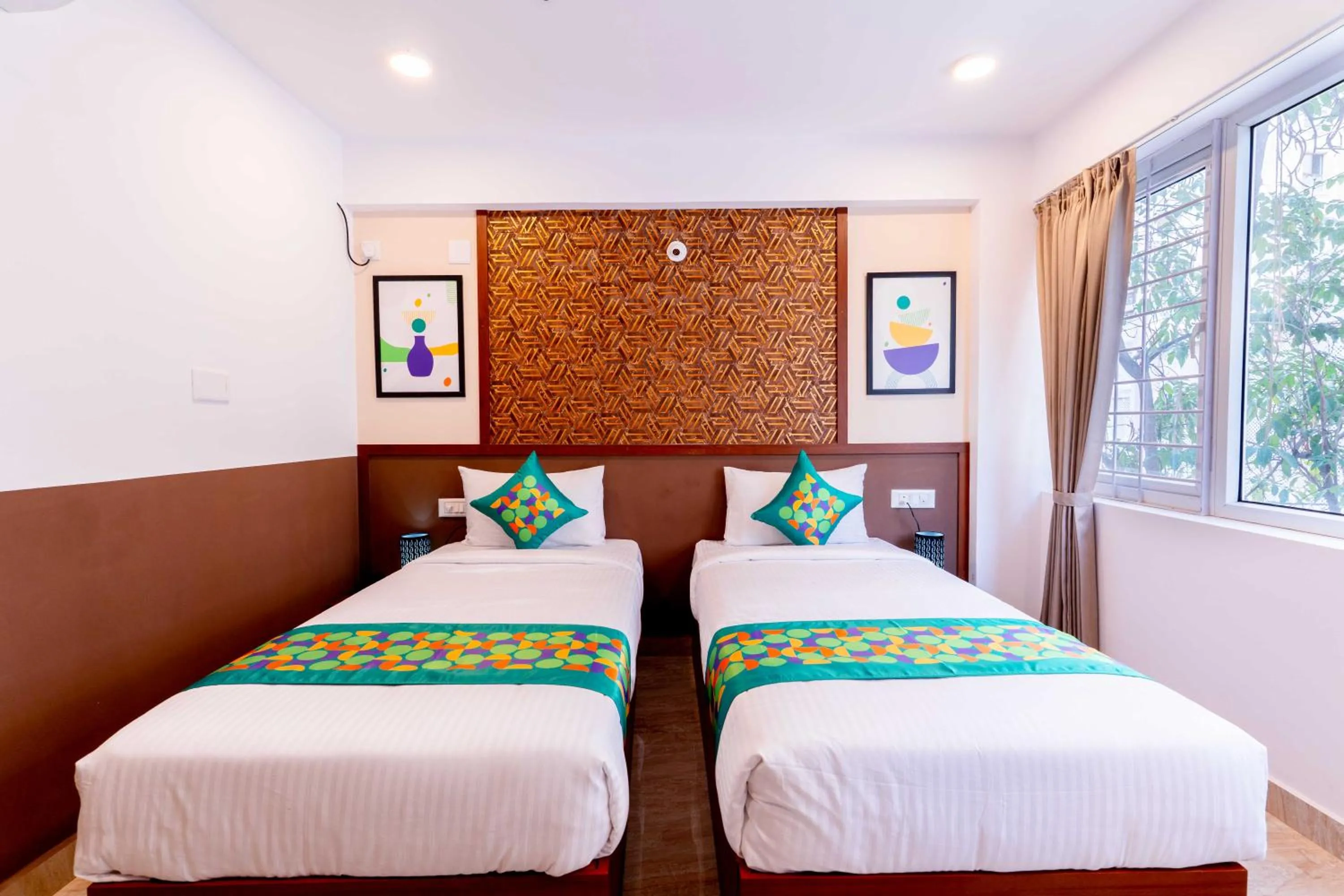 Bedroom, Bed in Treebo Emirates Suites Indiranagar