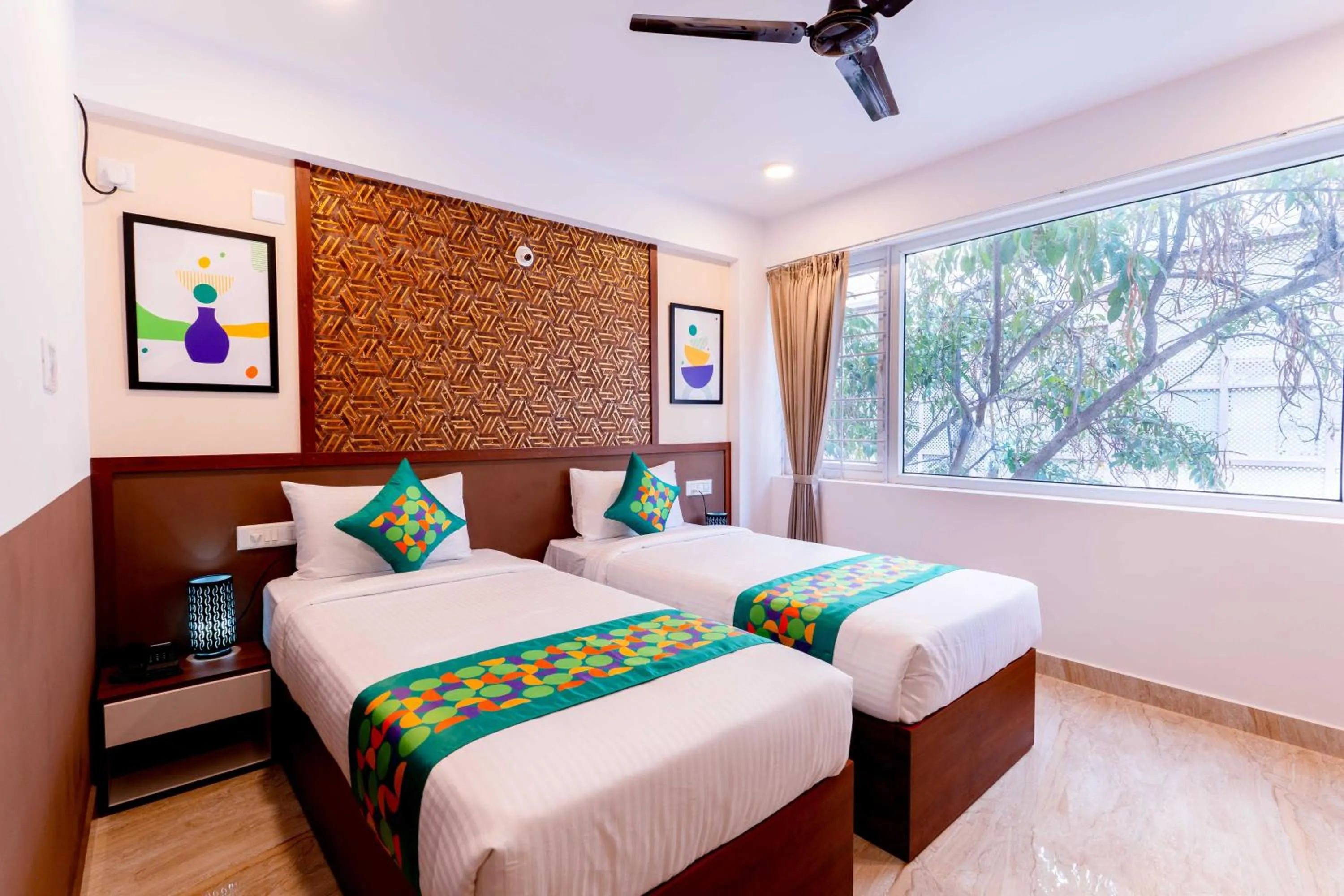 Bedroom, Bed in Treebo Emirates Suites Indiranagar