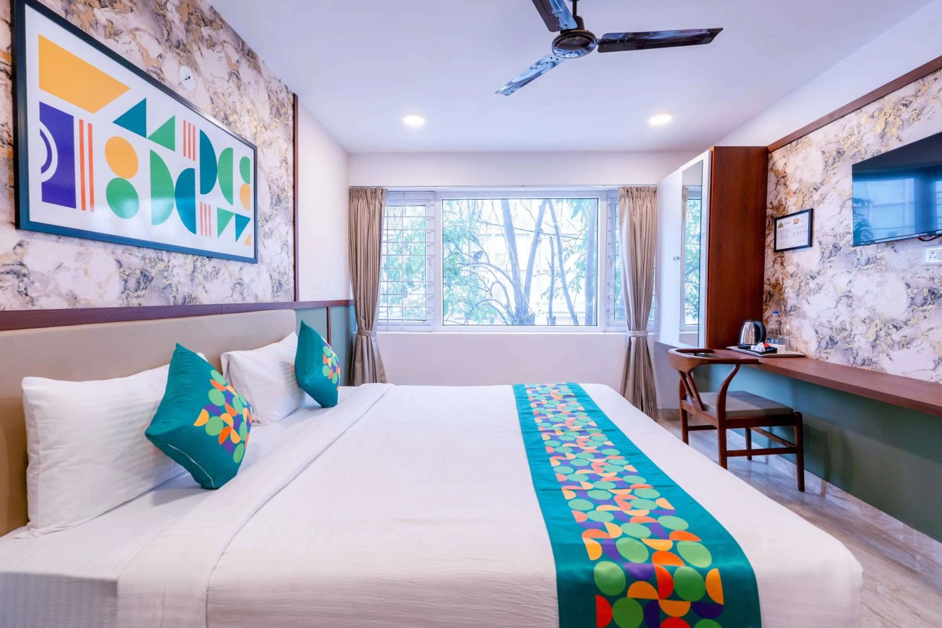 Bedroom, Bed in Treebo Emirates Suites Indiranagar