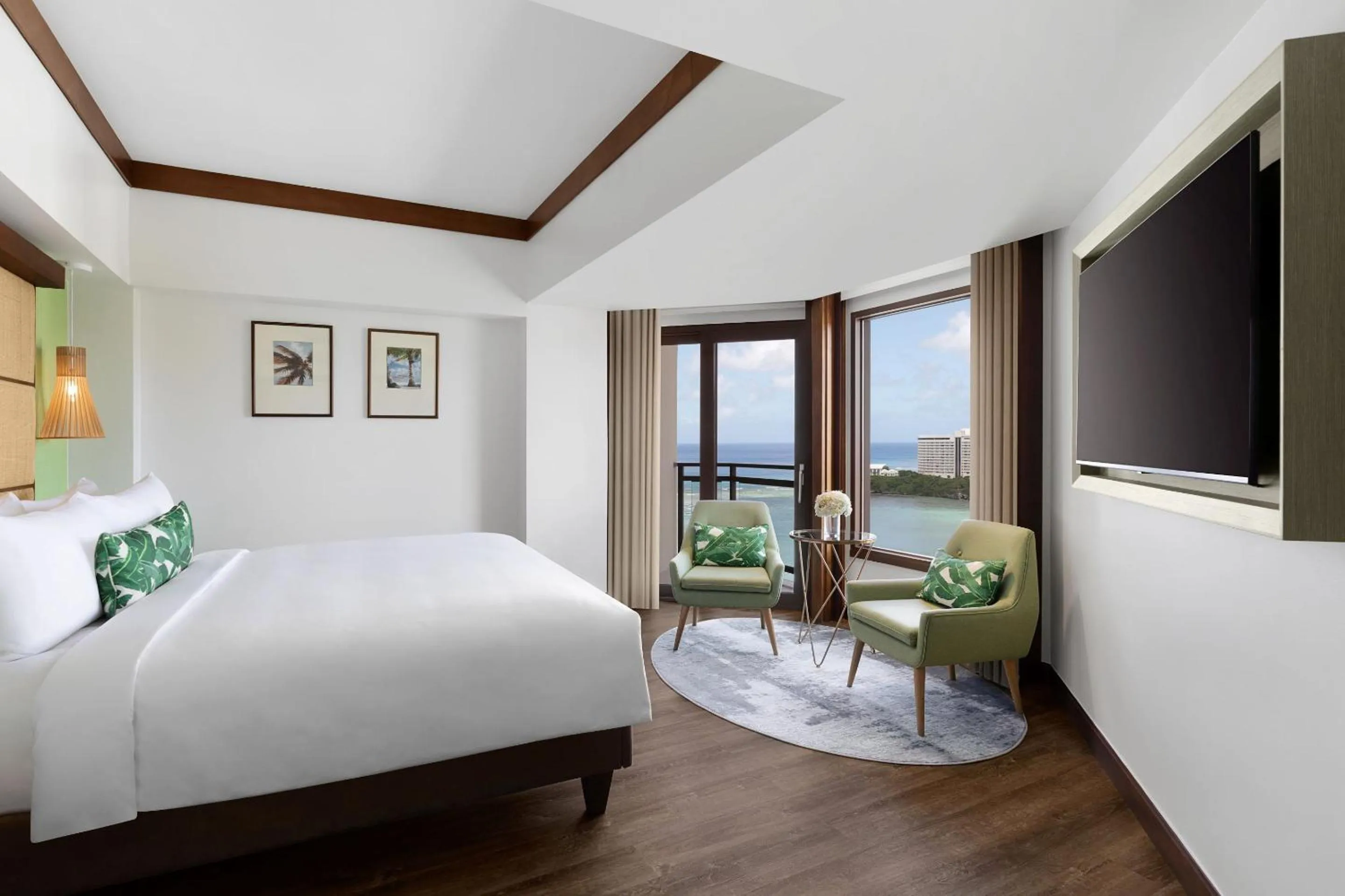 Communal lounge/ TV room, Bed in Dusit Beach Resort Guam