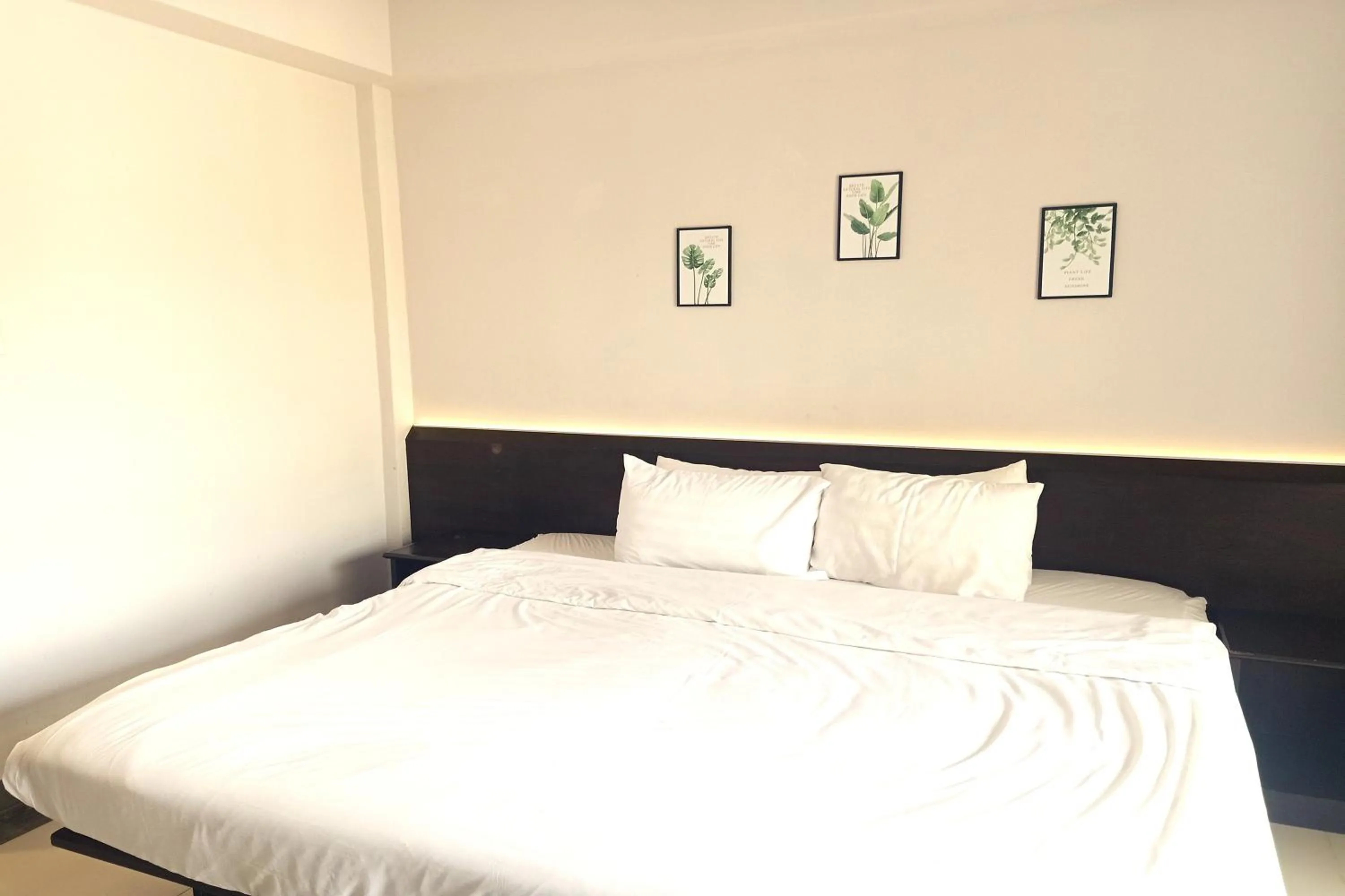 Bed in Smile Place Hotel Chiang Rai