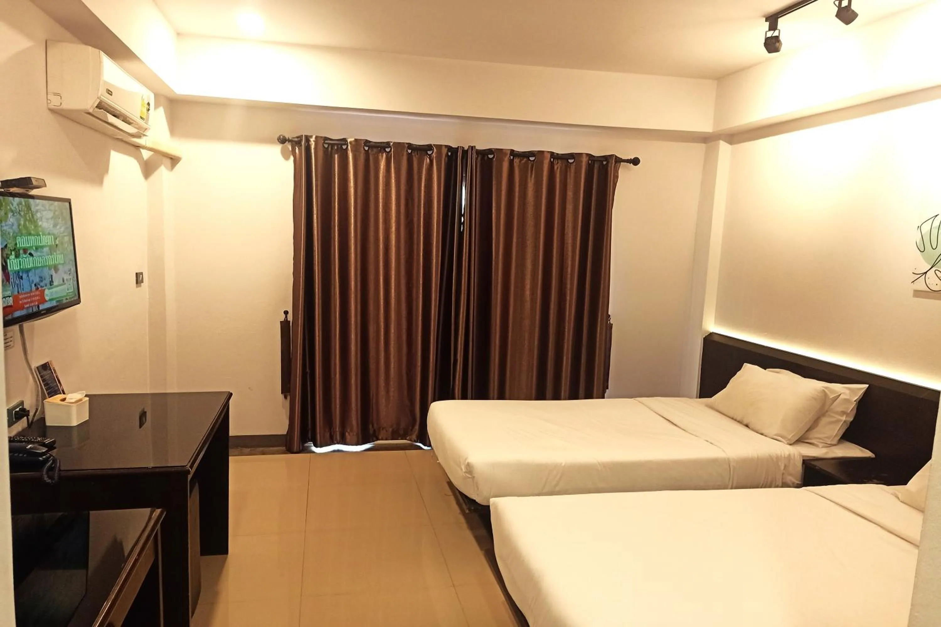 Bed in Smile Place Hotel Chiang Rai