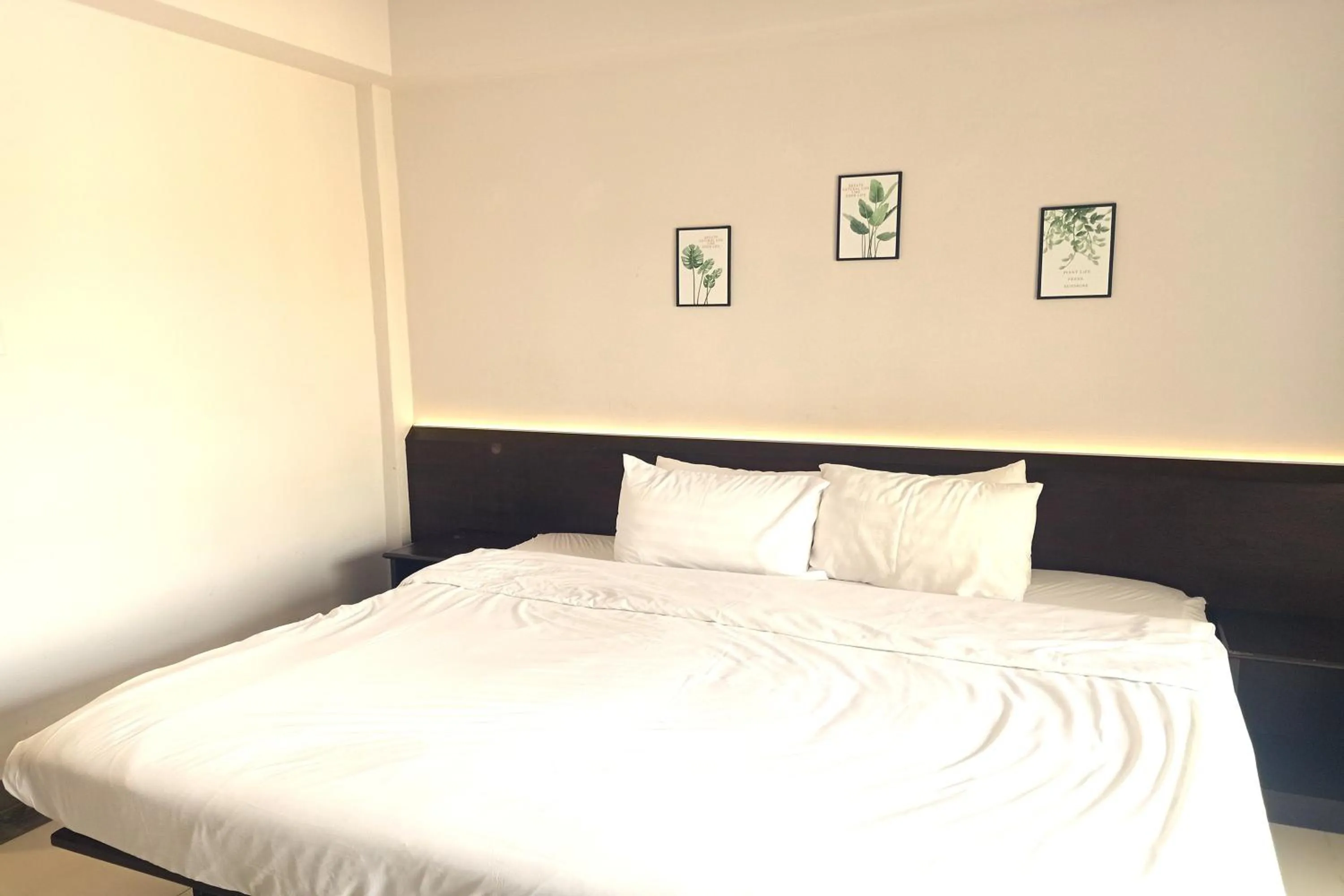 Bed in Smile Place Hotel Chiang Rai