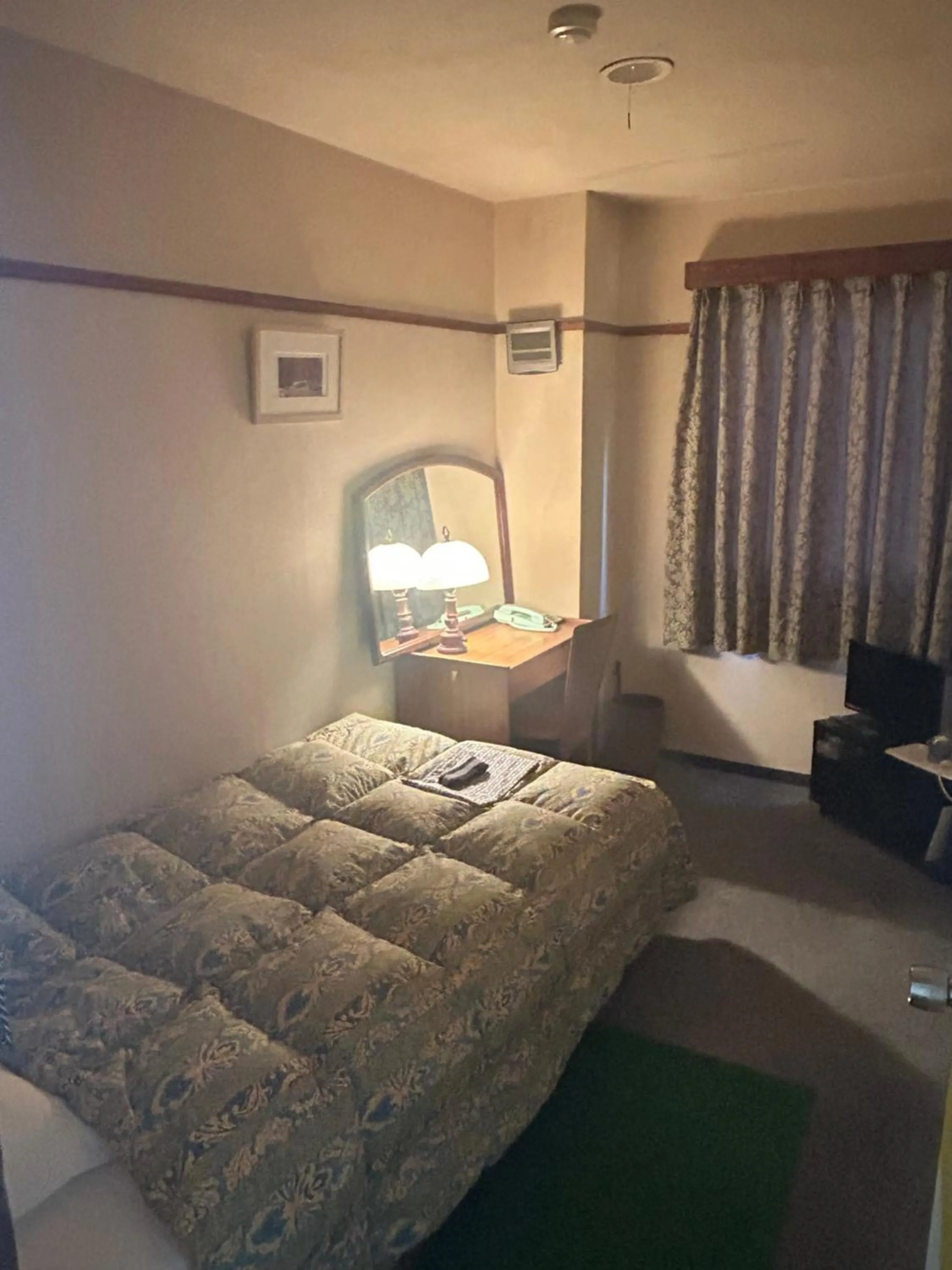 Bed in Business Hotel Nakayama