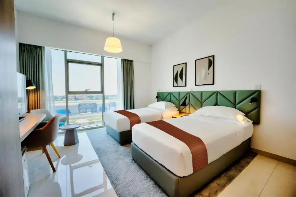 Bed in Capital Suites Hotel Apartments Bed in Capital Suites Hotel Apartments