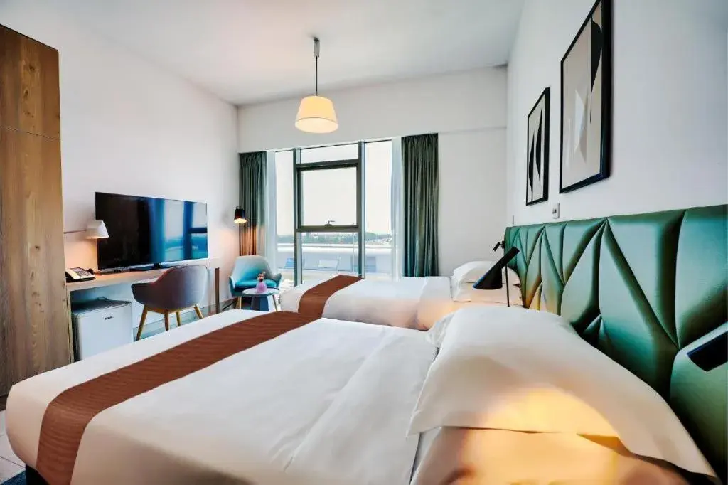 Bed in Capital Suites Hotel Apartments Bed in Capital Suites Hotel Apartments