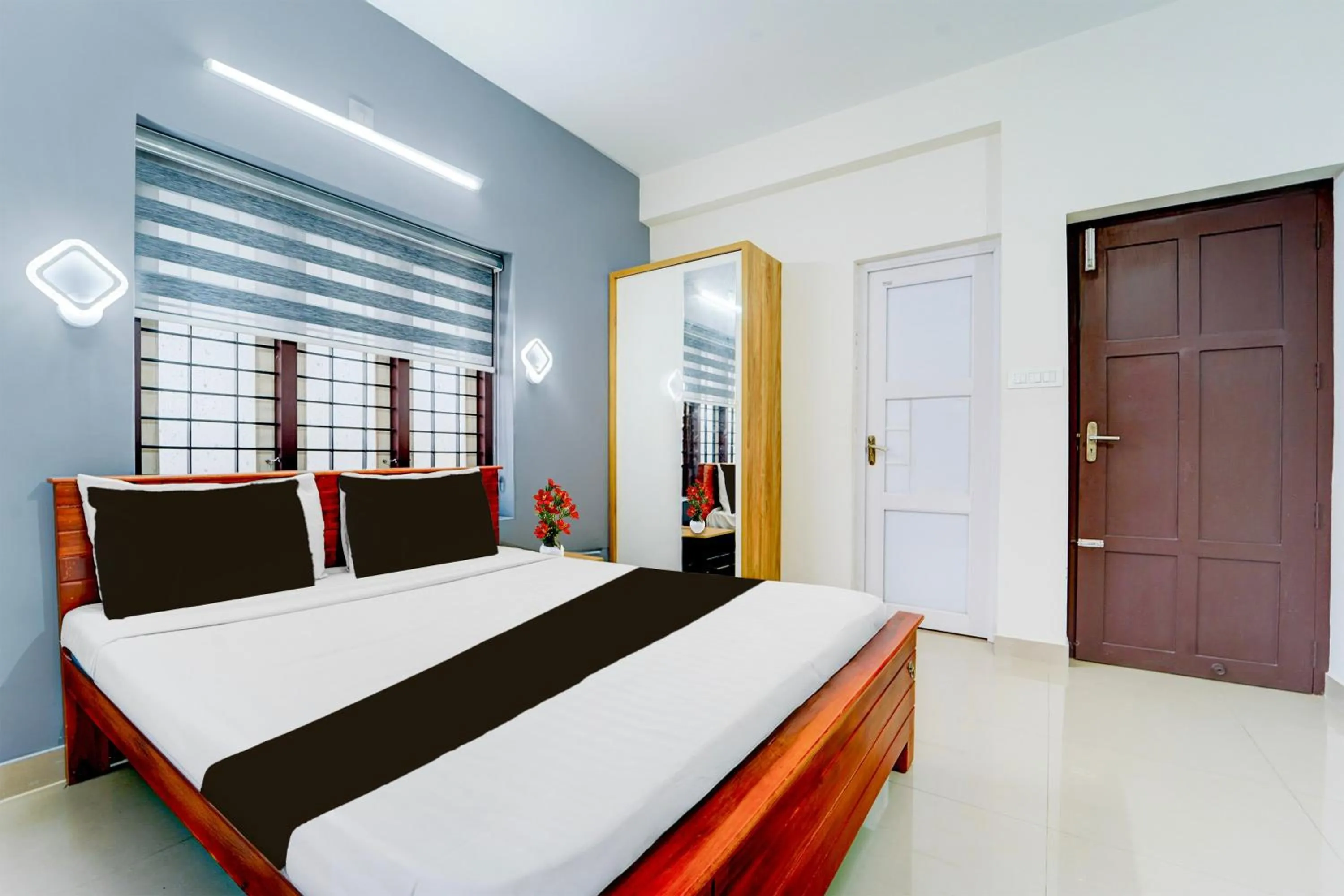 Bedroom, Bed in Super Hotel O Kazhakootam Near Technopark Phase 2