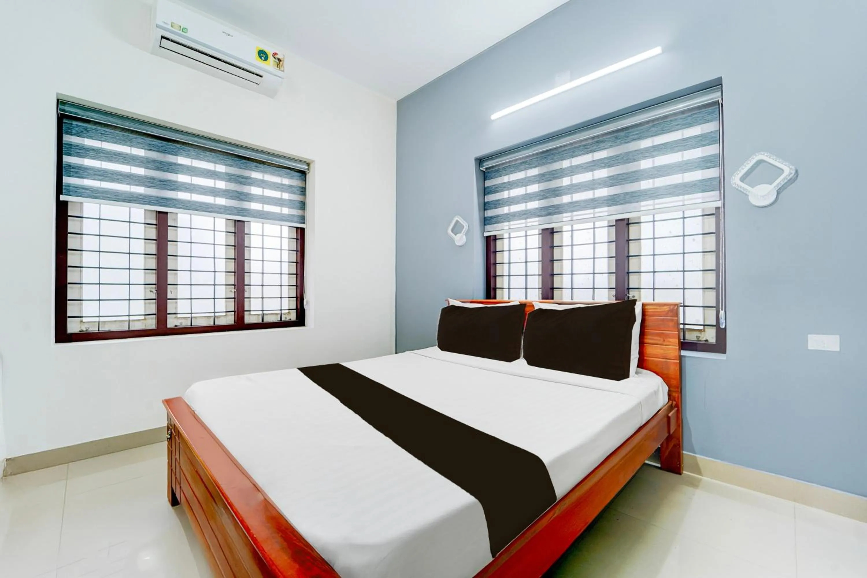 Bedroom, Bed in Super Hotel O Kazhakootam Near Technopark Phase 2