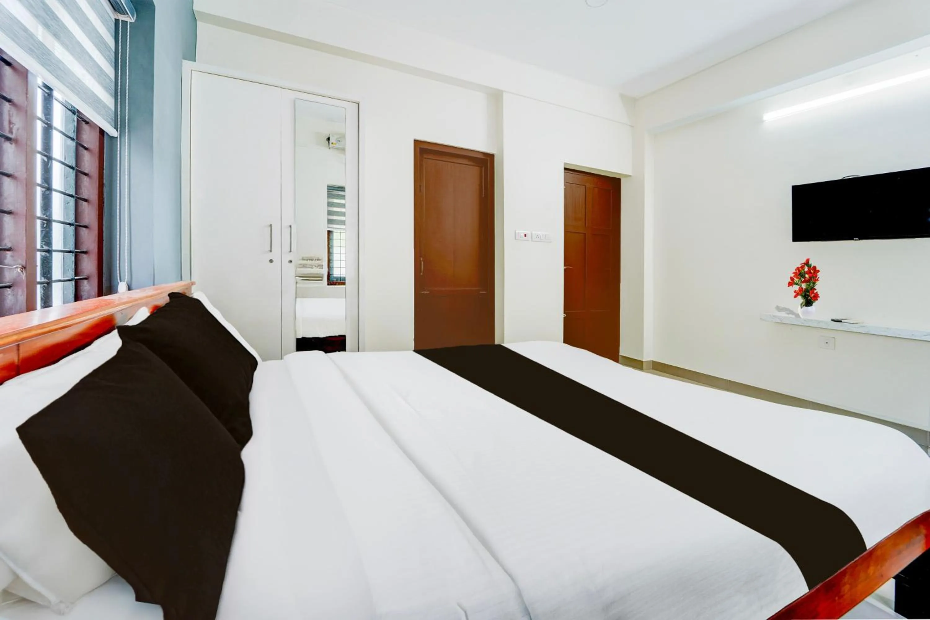 Bedroom, Bed in Super Hotel O Kazhakootam Near Technopark Phase 2