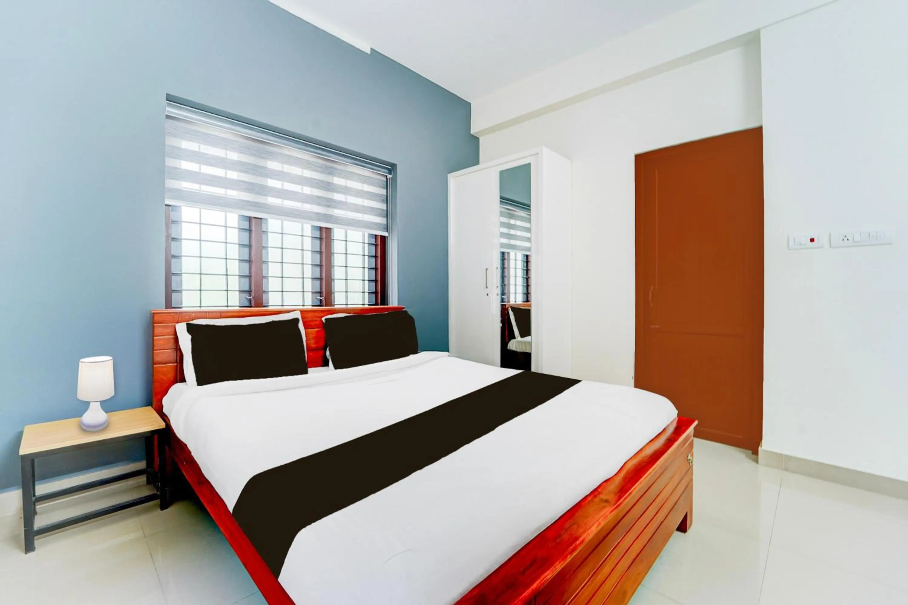 Bedroom, Bed in Super Hotel O Kazhakootam Near Technopark Phase 2