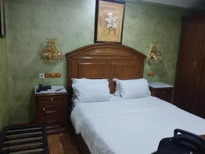 Bed in Hotel Ville Des Roses Bed in Hotel Ville Des Roses