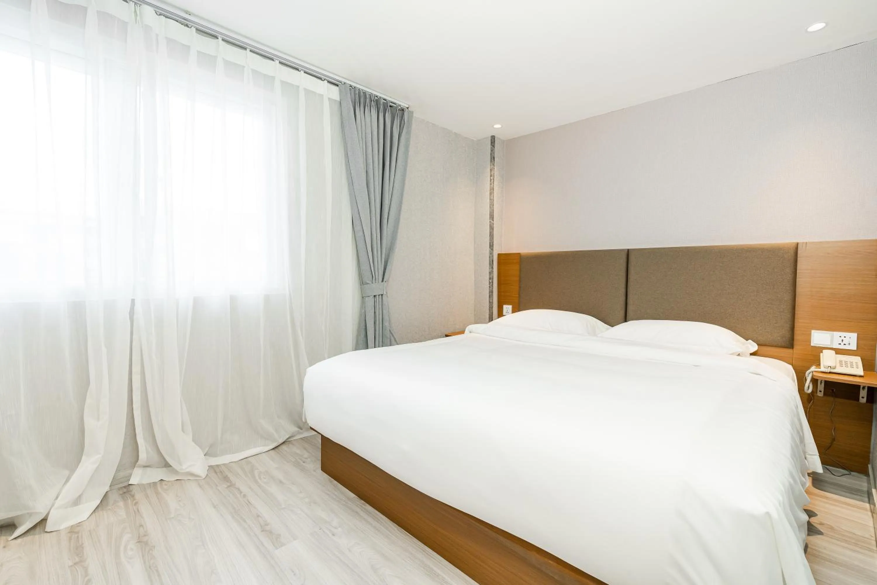 Bed in Aurea Delight Hotel