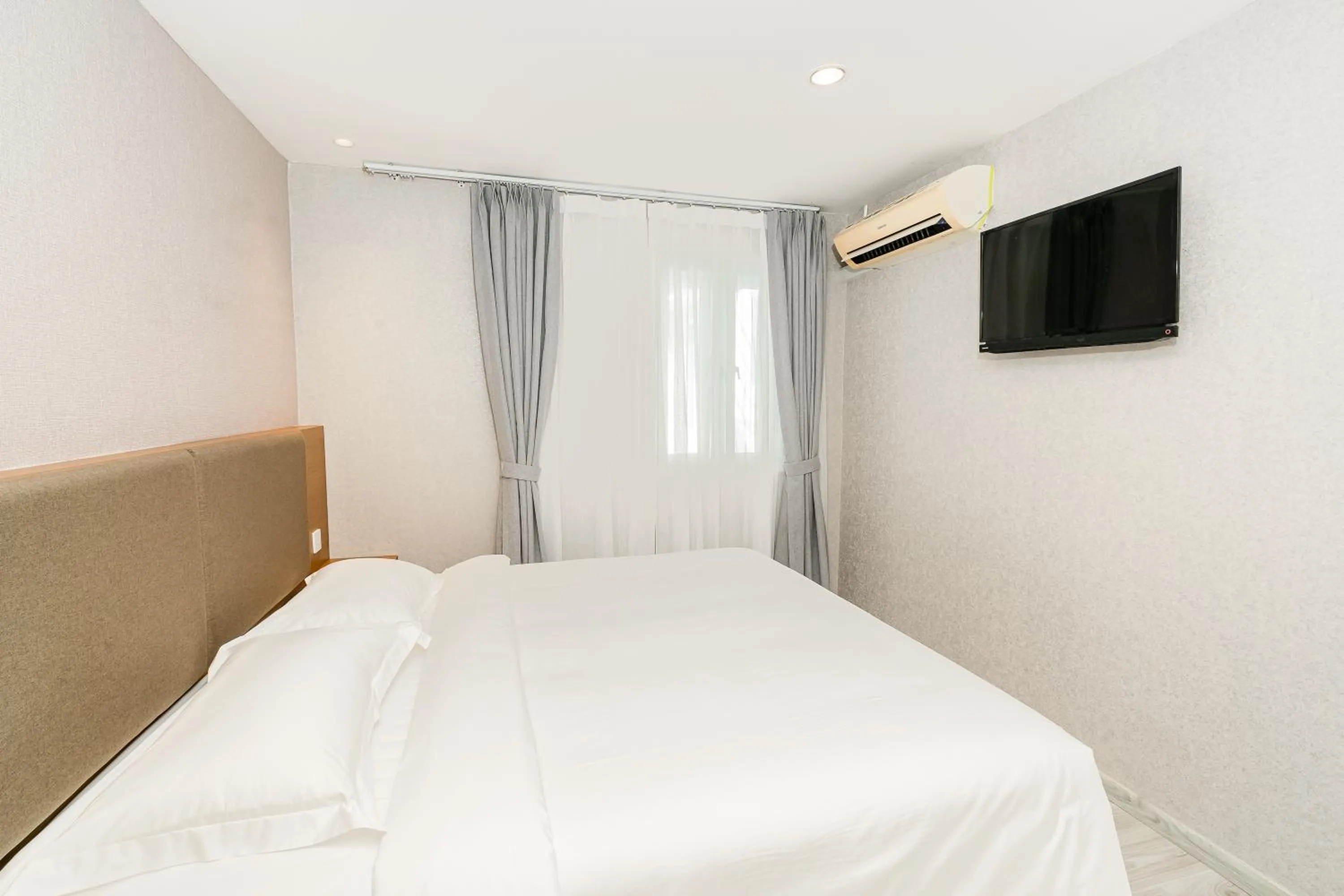 Bed in Aurea Delight Hotel