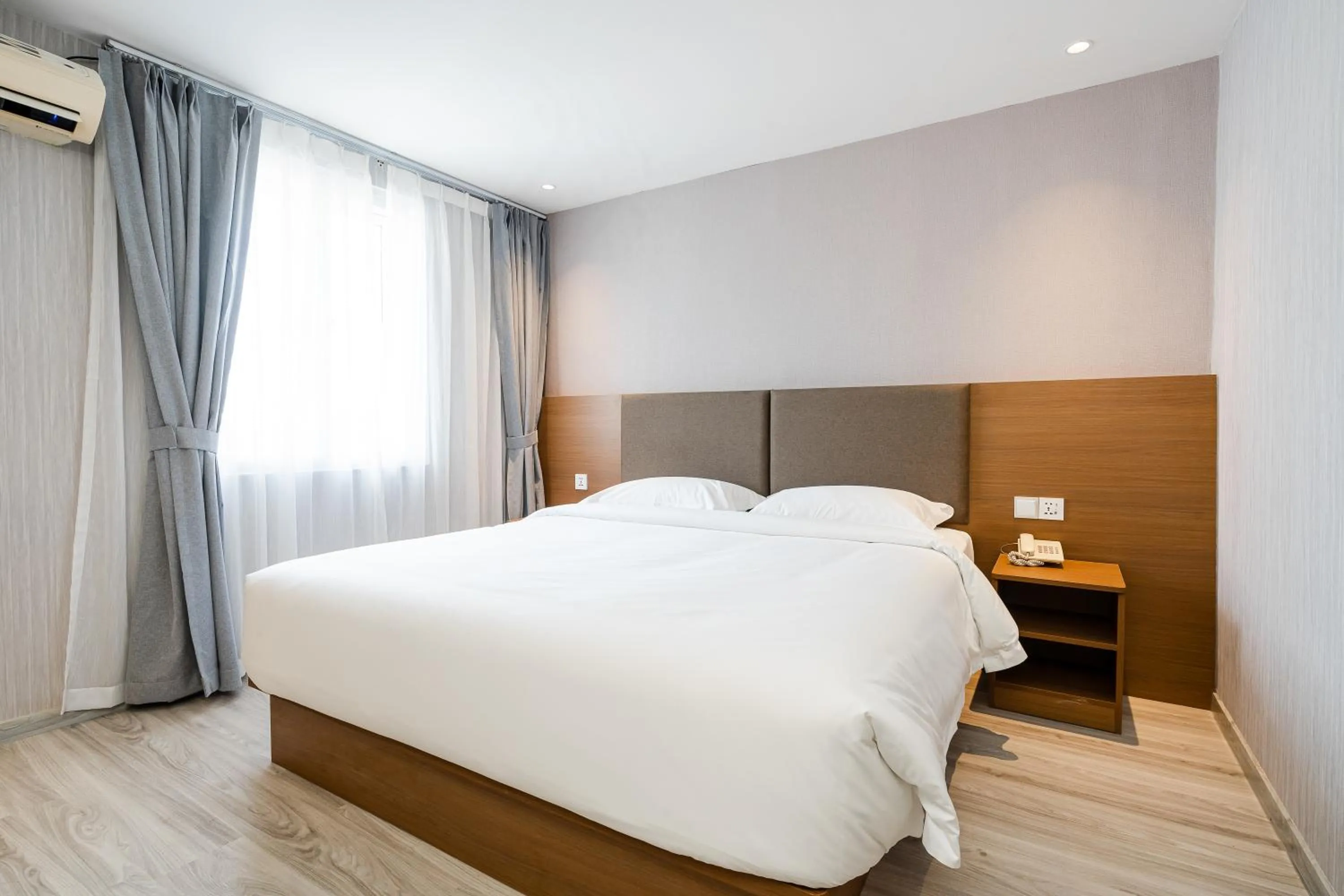 Bed in Aurea Delight Hotel