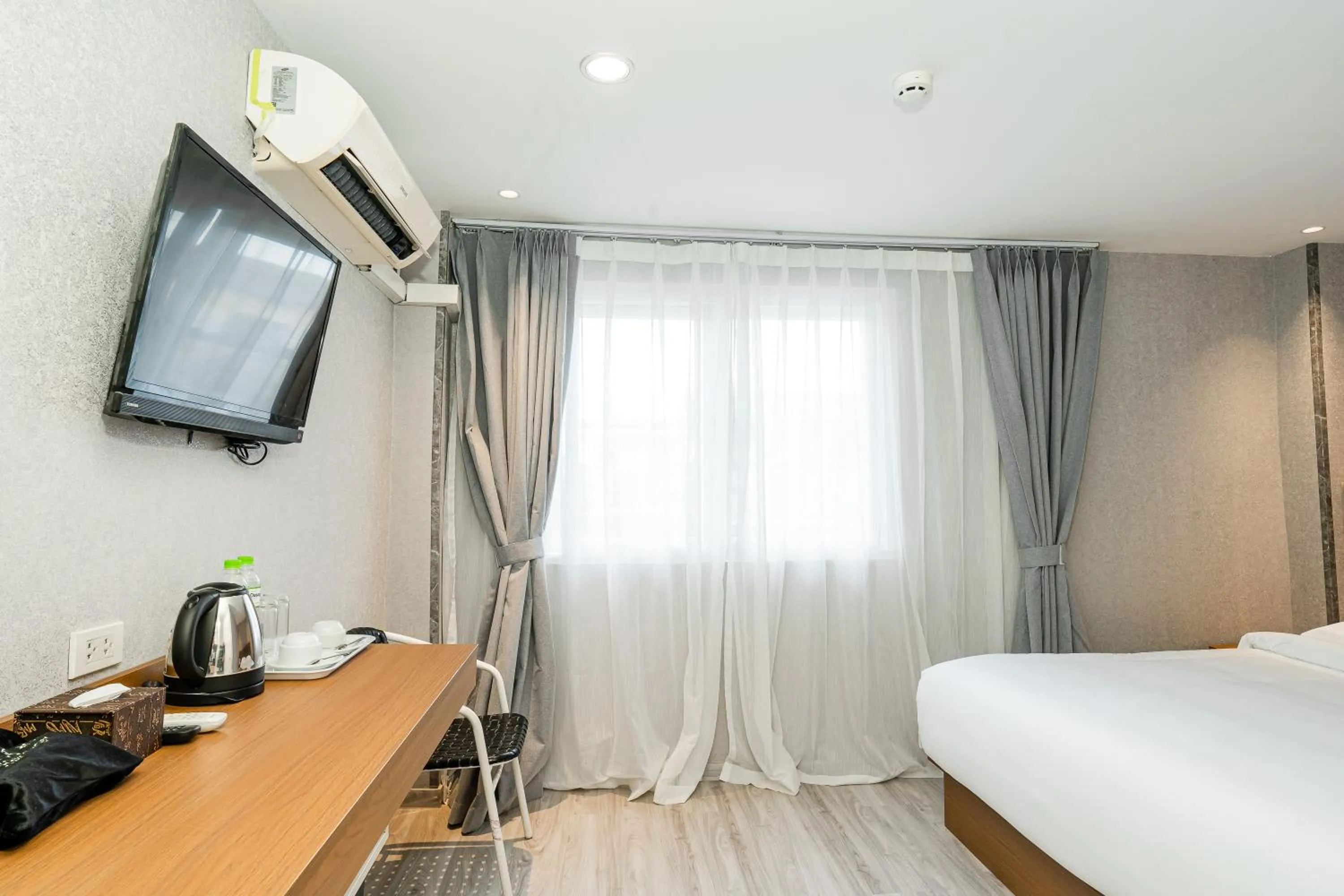 Bed in Aurea Delight Hotel