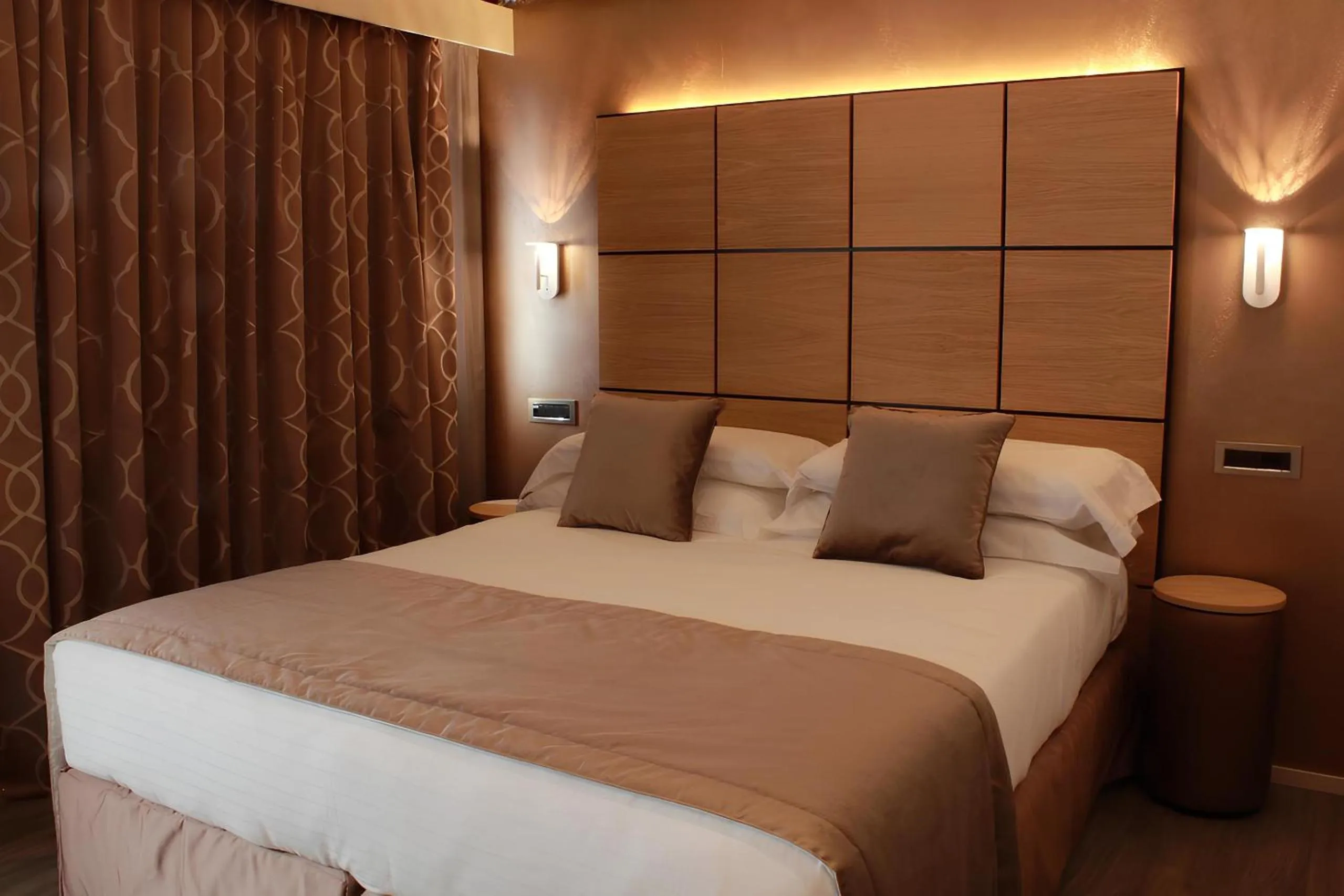 Bed in Rosa Salva Hotel