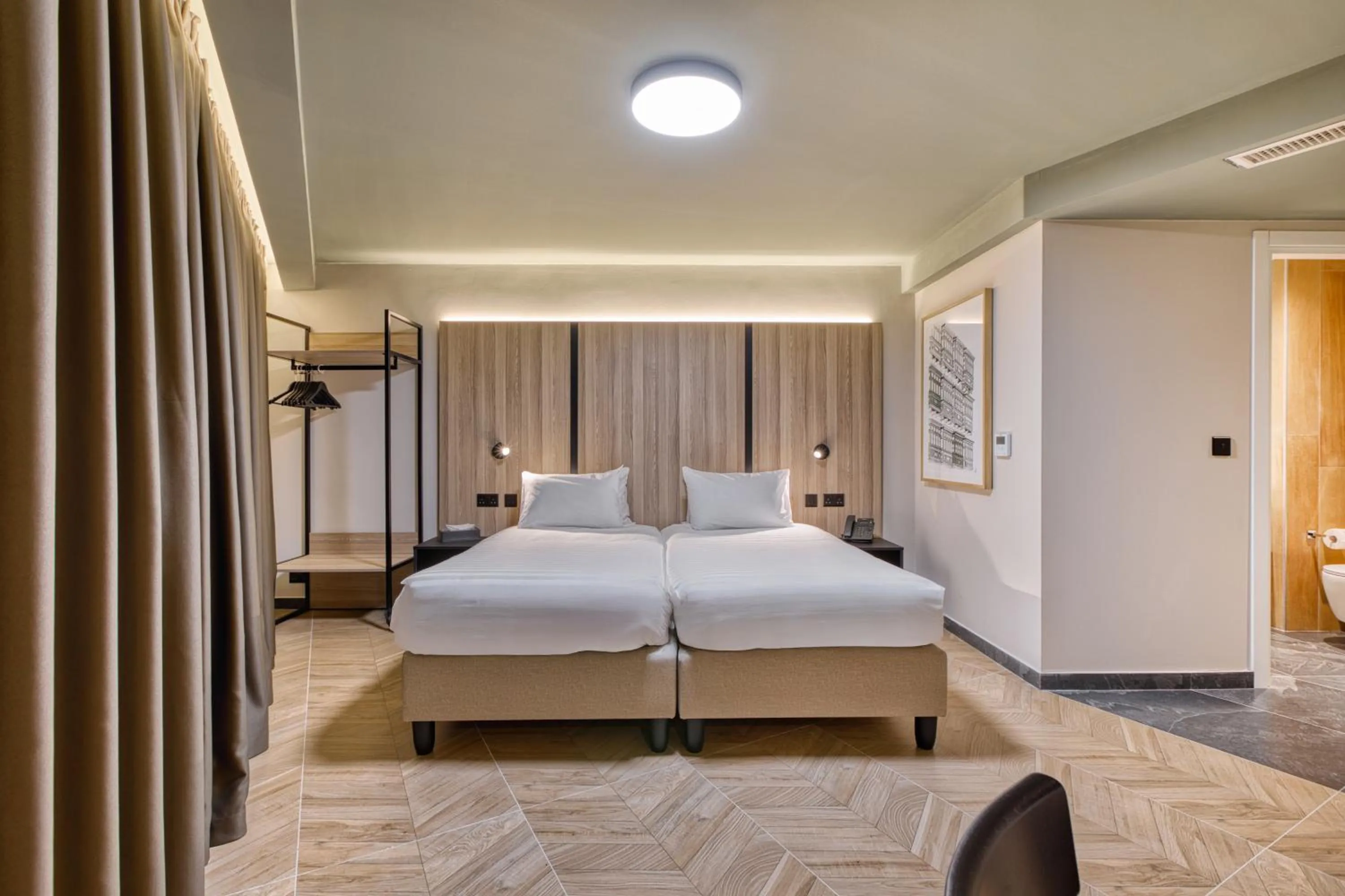 Bed in VITA Hotel & Rooftop