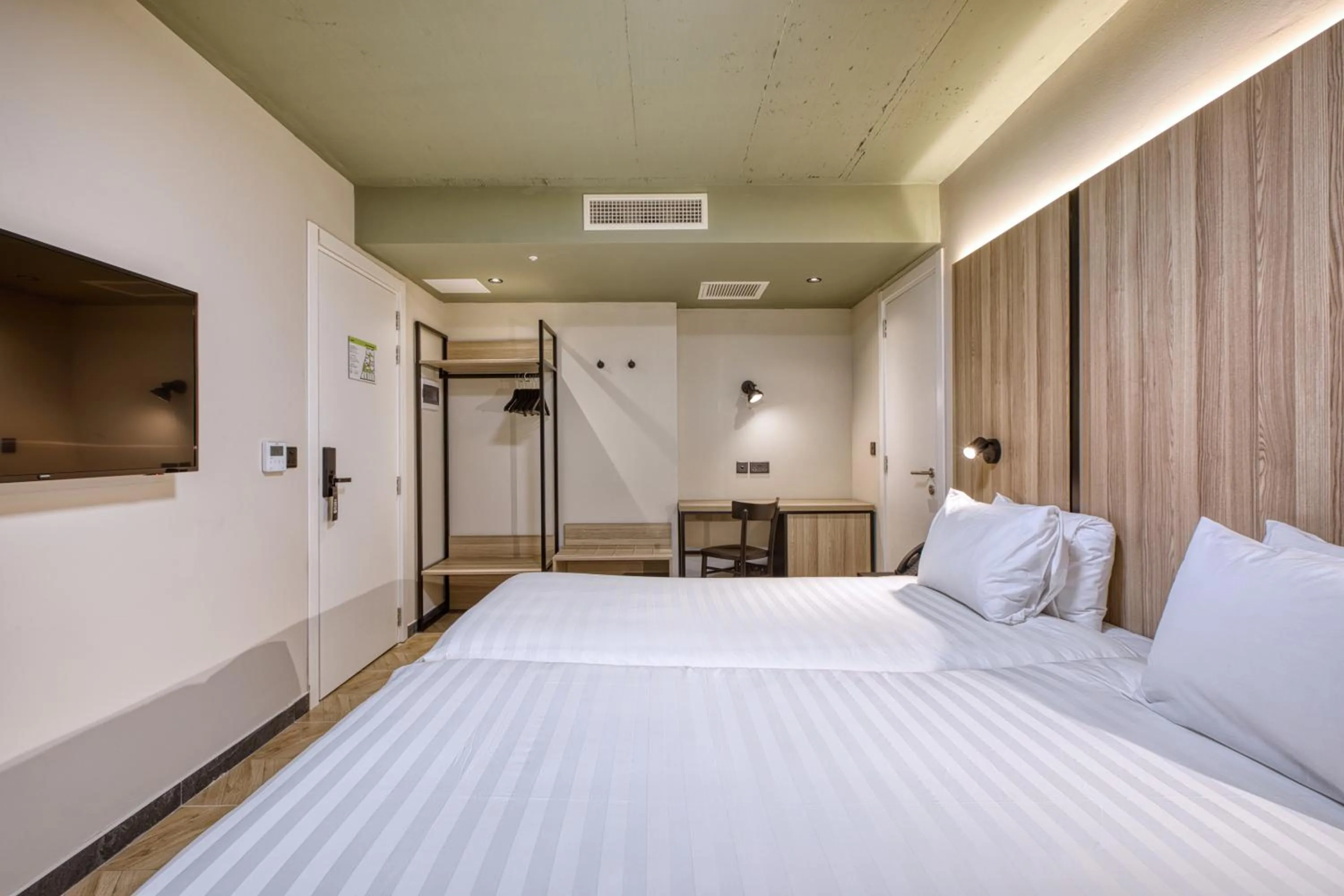 Bed in VITA Hotel & Rooftop