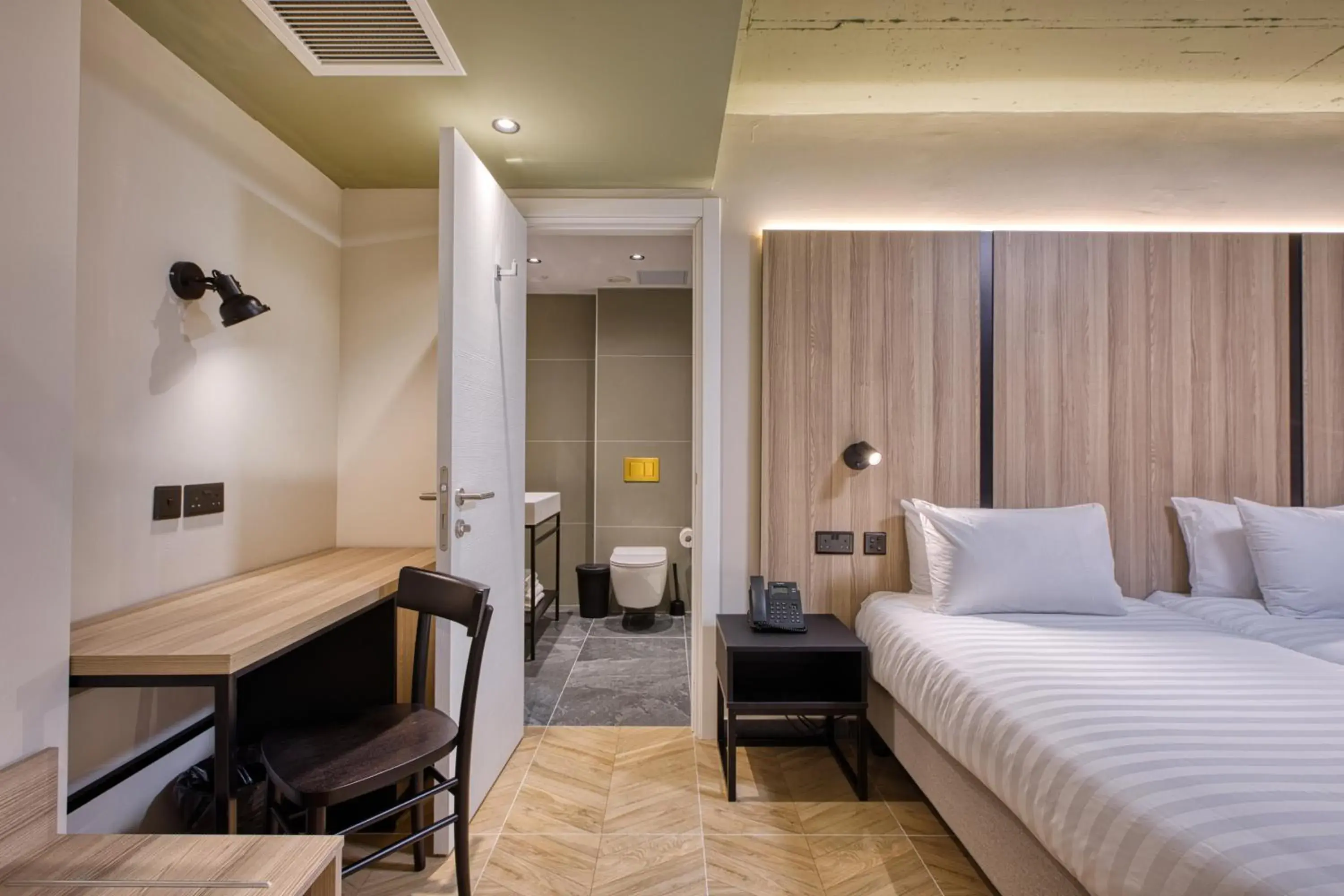 Bed in VITA Hotel & Rooftop Bed in VITA Hotel & Rooftop