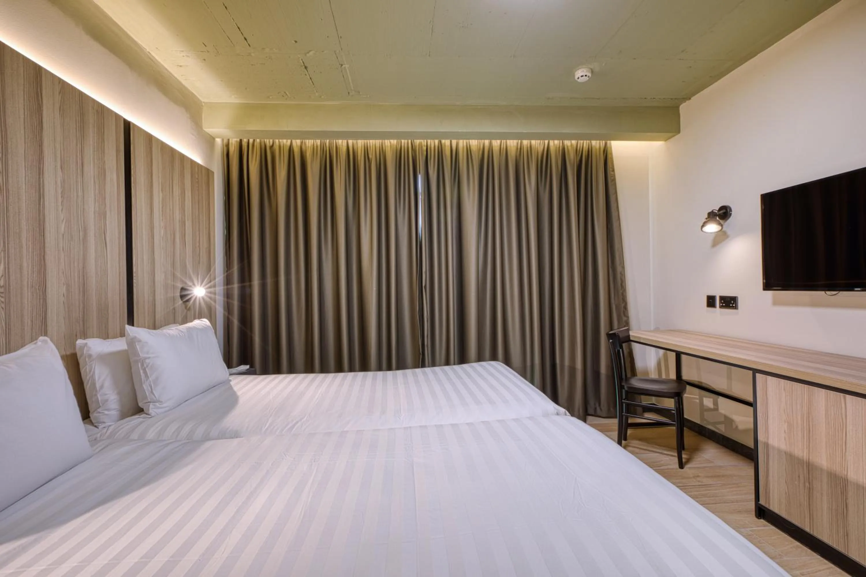 Bed in VITA Hotel & Rooftop