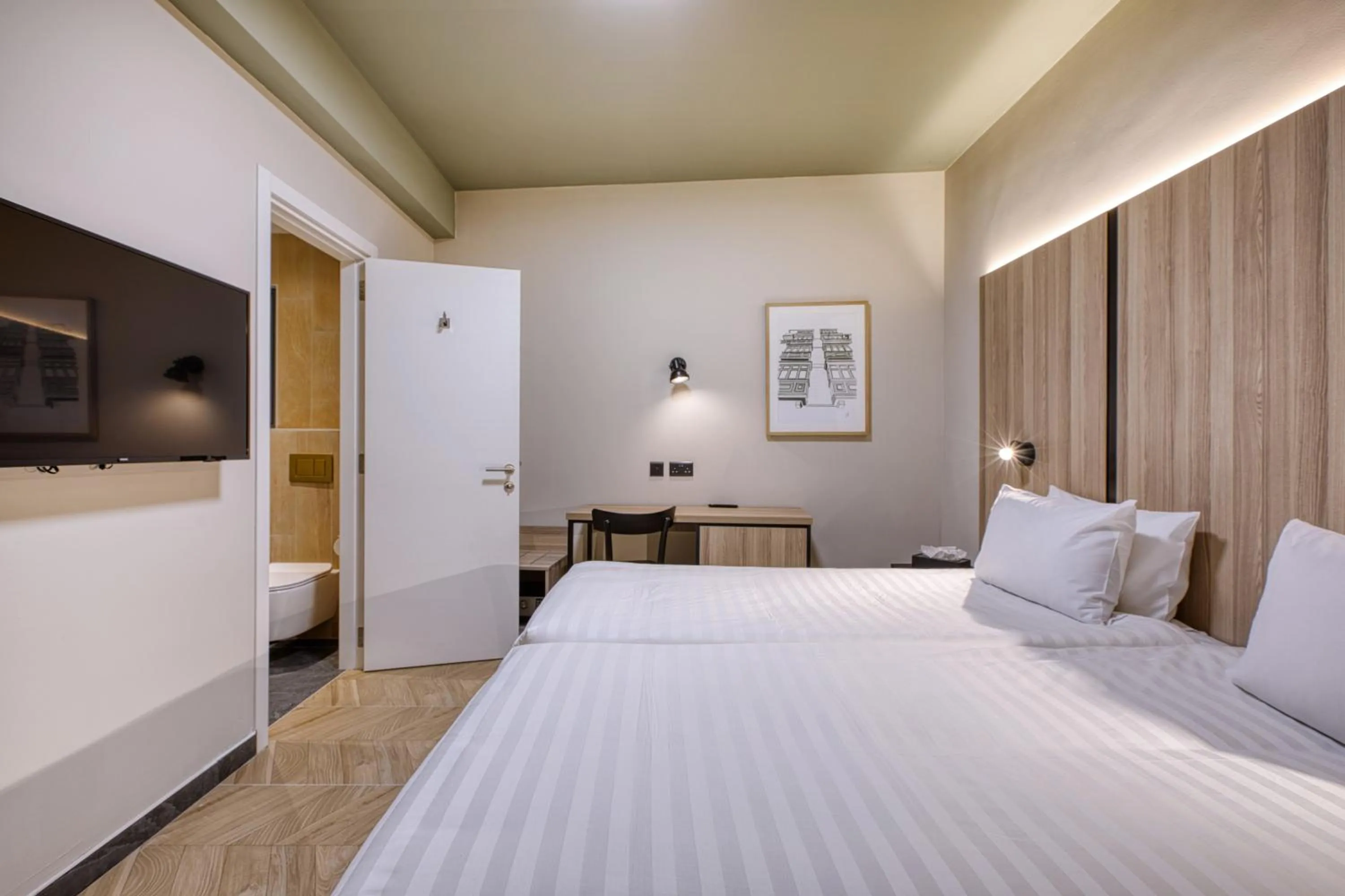 Bed in VITA Hotel & Rooftop