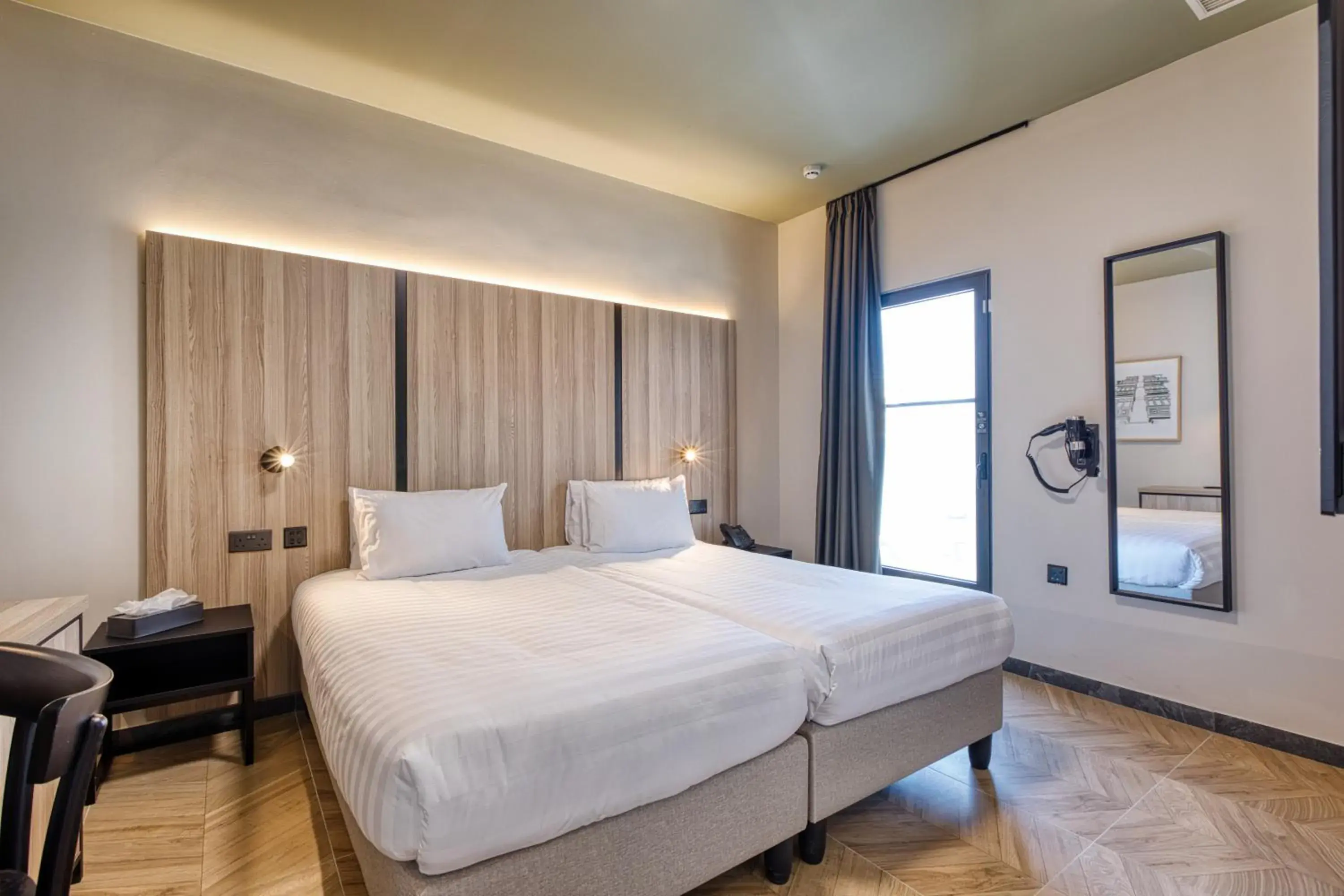 Bed in VITA Hotel & Rooftop Bed in VITA Hotel & Rooftop